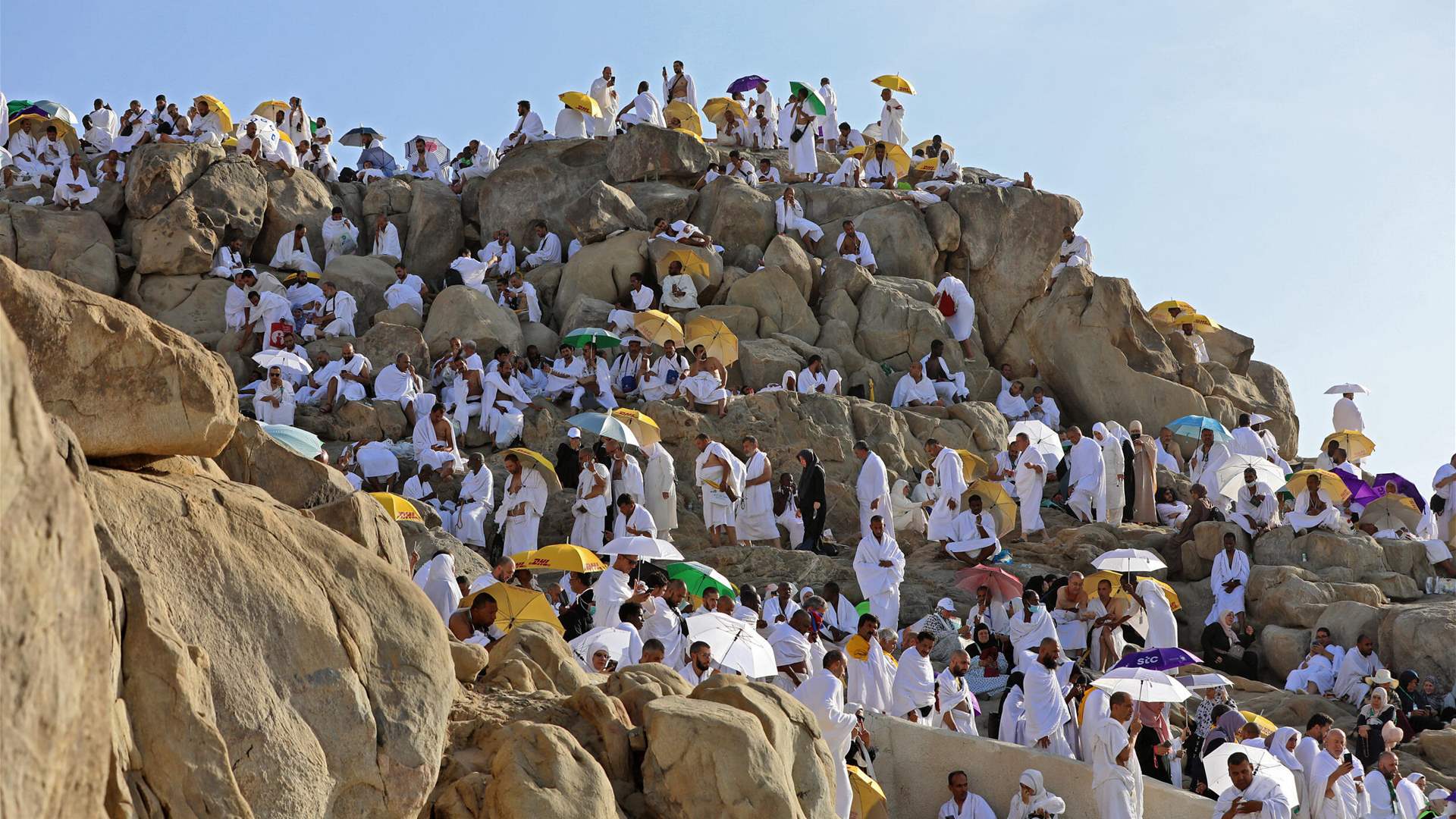Pilgrims ascend Mount Arafat as hajj peaks under fierce sun