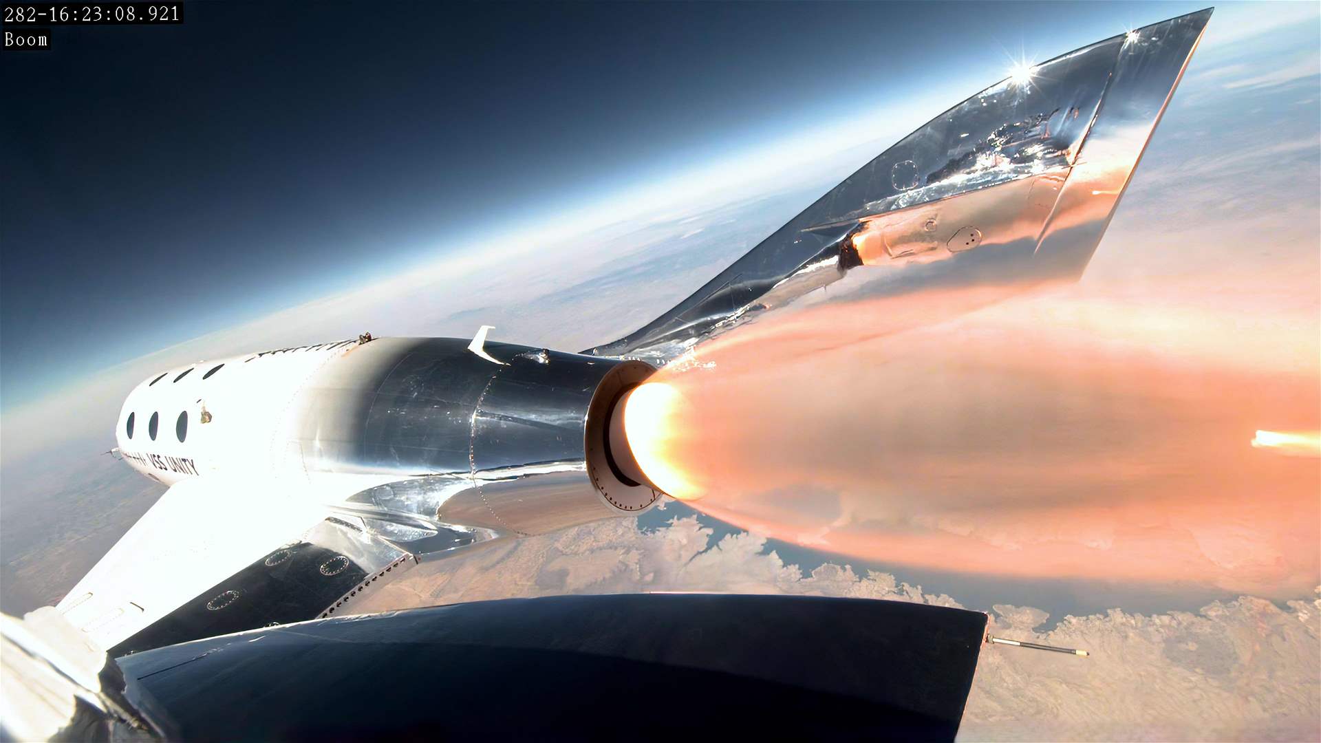Virgin Galactic takes first paying customers to space: company