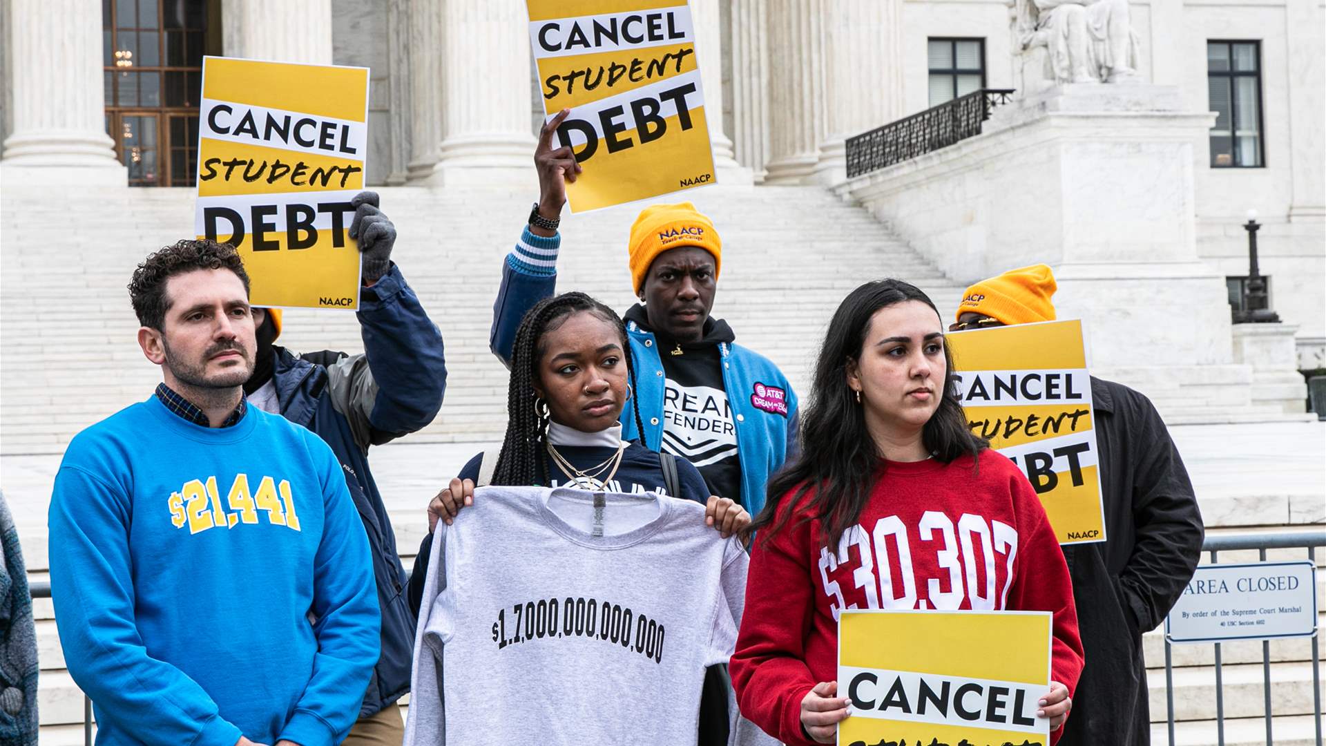 Back on hook for loans, Americans decry 'unjust' student debt