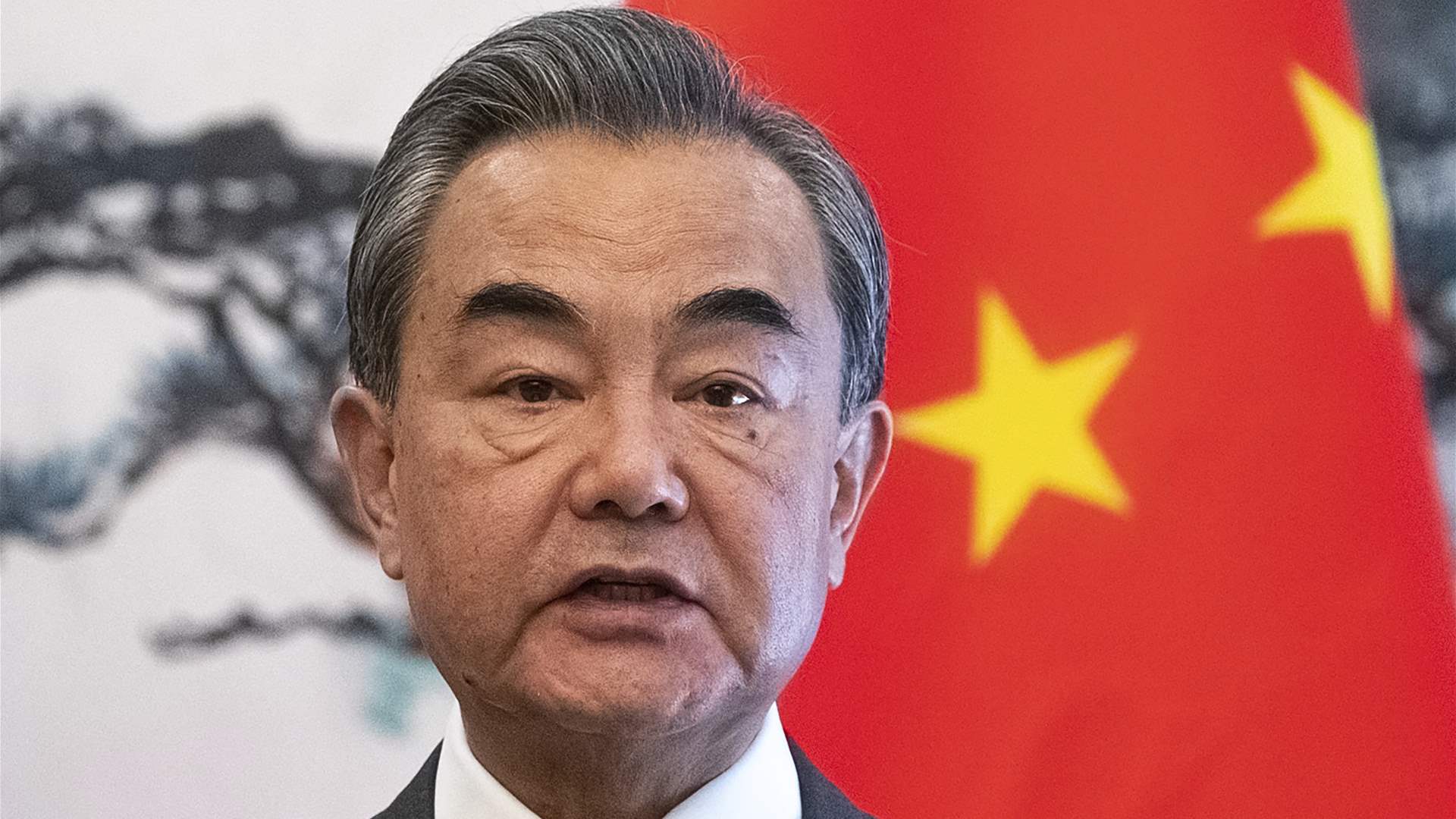 China's top diplomat: Washington should work with China "to improve relations between the two countries