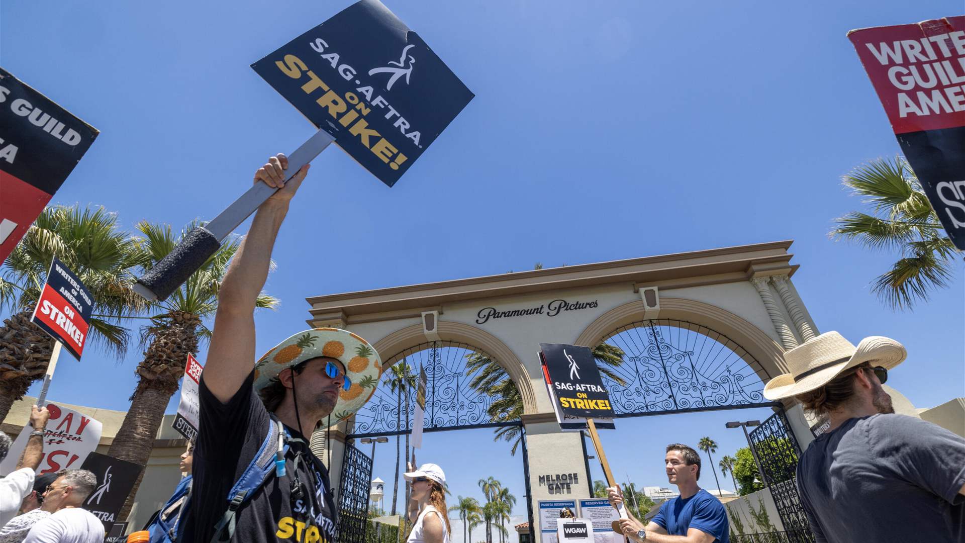 Actors protest on Hollywood sidewalks and pour anger on studios