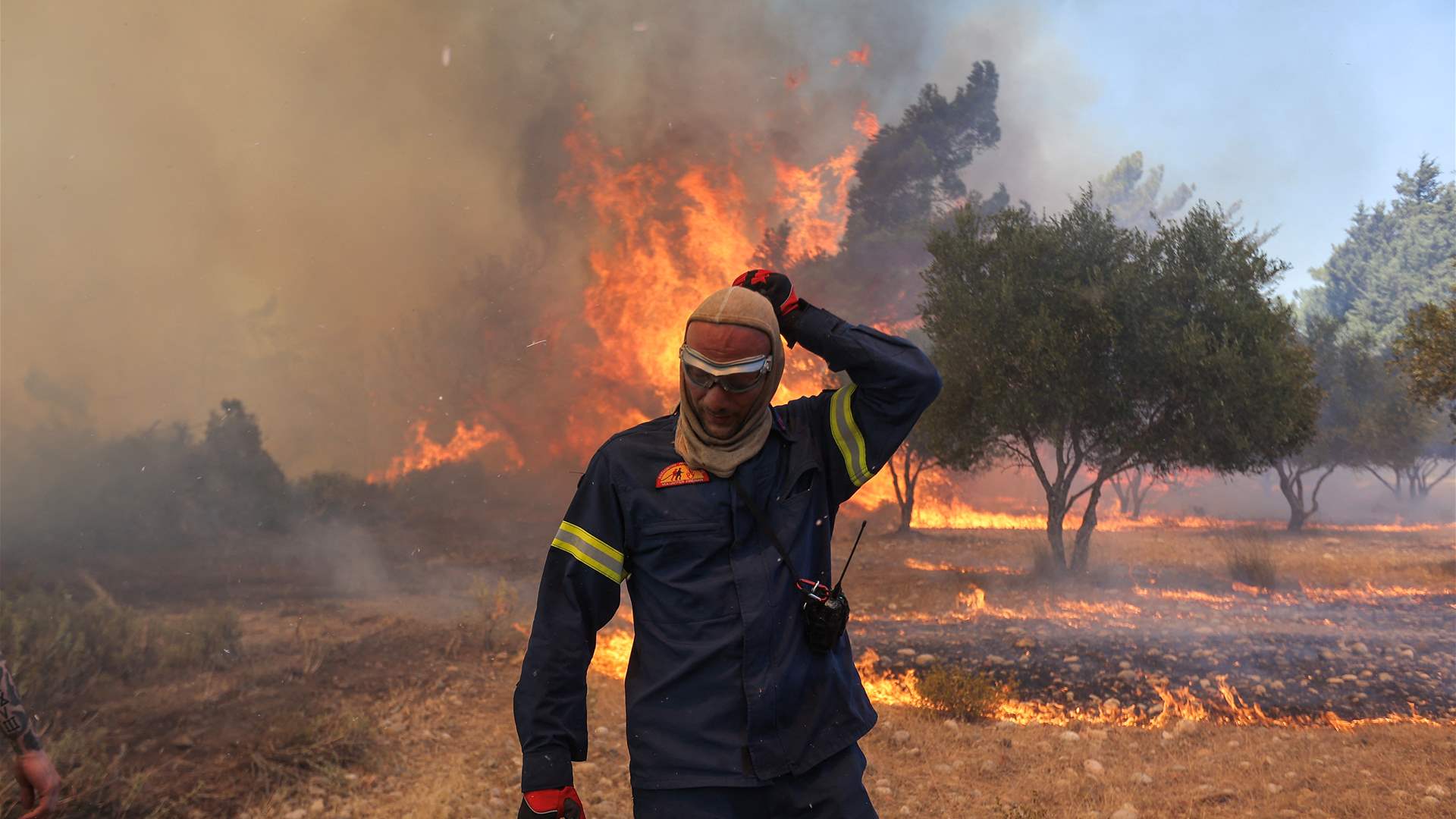 Greek firefighters continue battle against wildfires amidst strong winds