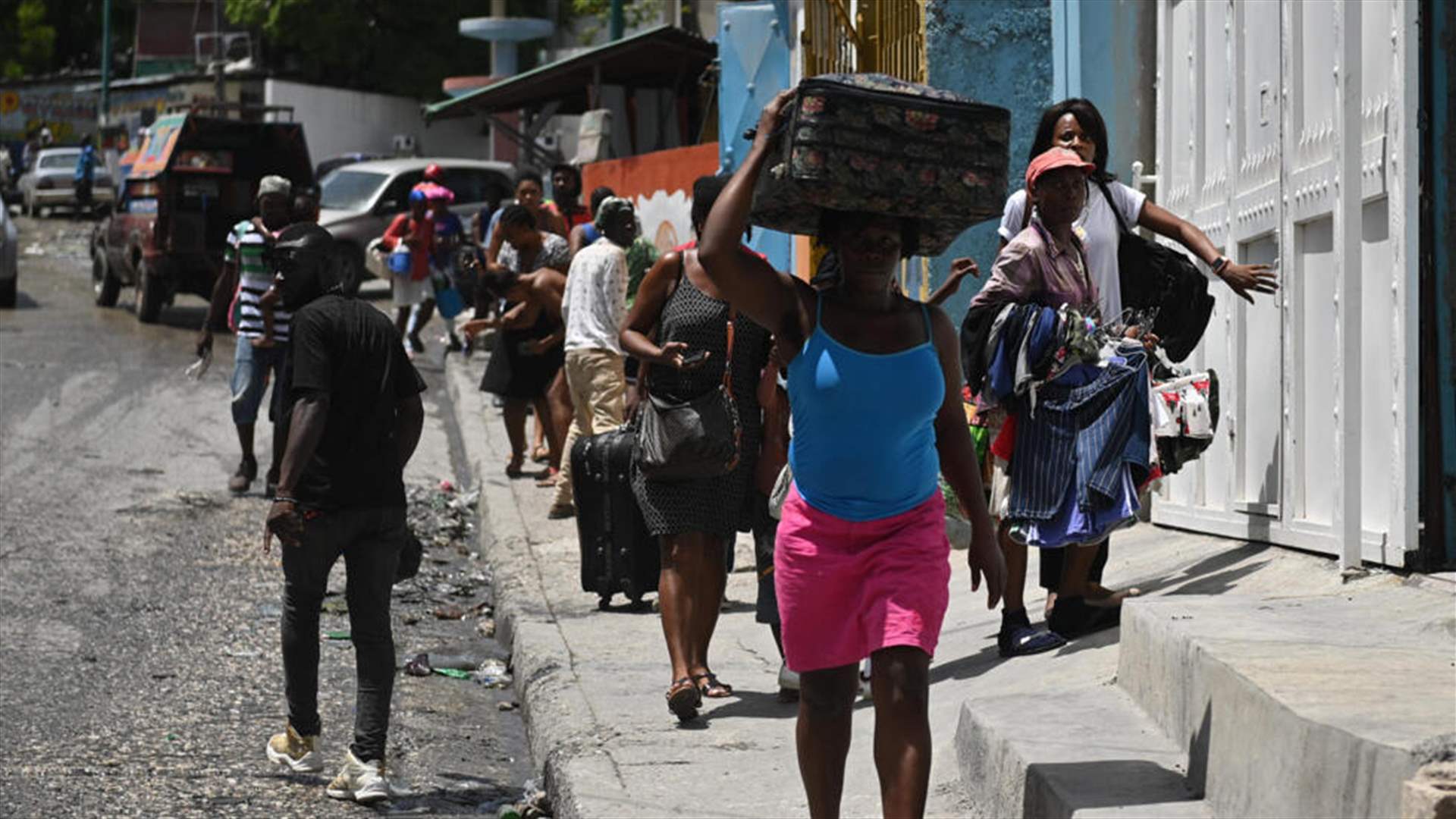 آلاف الهايتيين يفرون من حي في بور او برنس إثر هجوم شنته عصابة