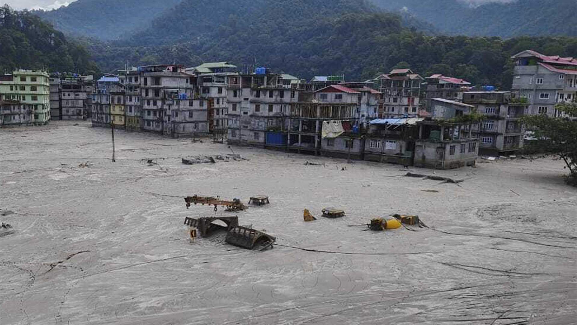India's flood death toll rises to 56 and army warns of washed-up ammunitions