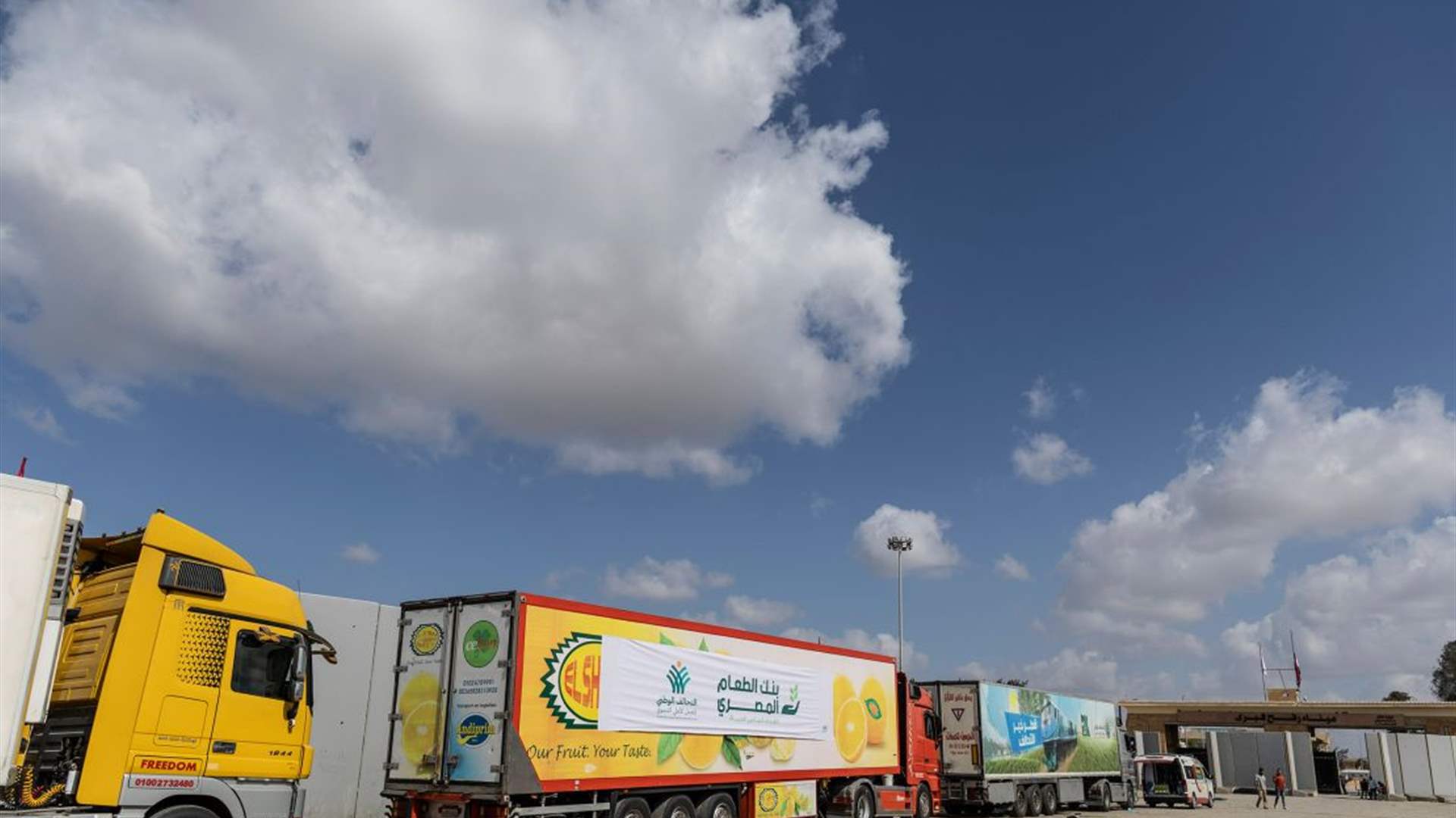 AFP: First humanitarian aid trucks enter Gaza Strip 