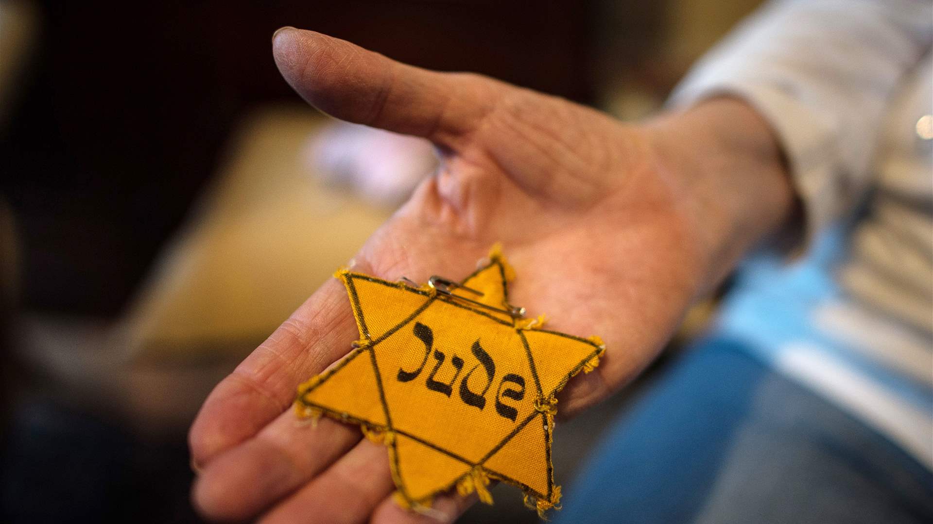 The yellow star and &#39;never again&#39;: The meaning behind Erdan&#39;s gesture