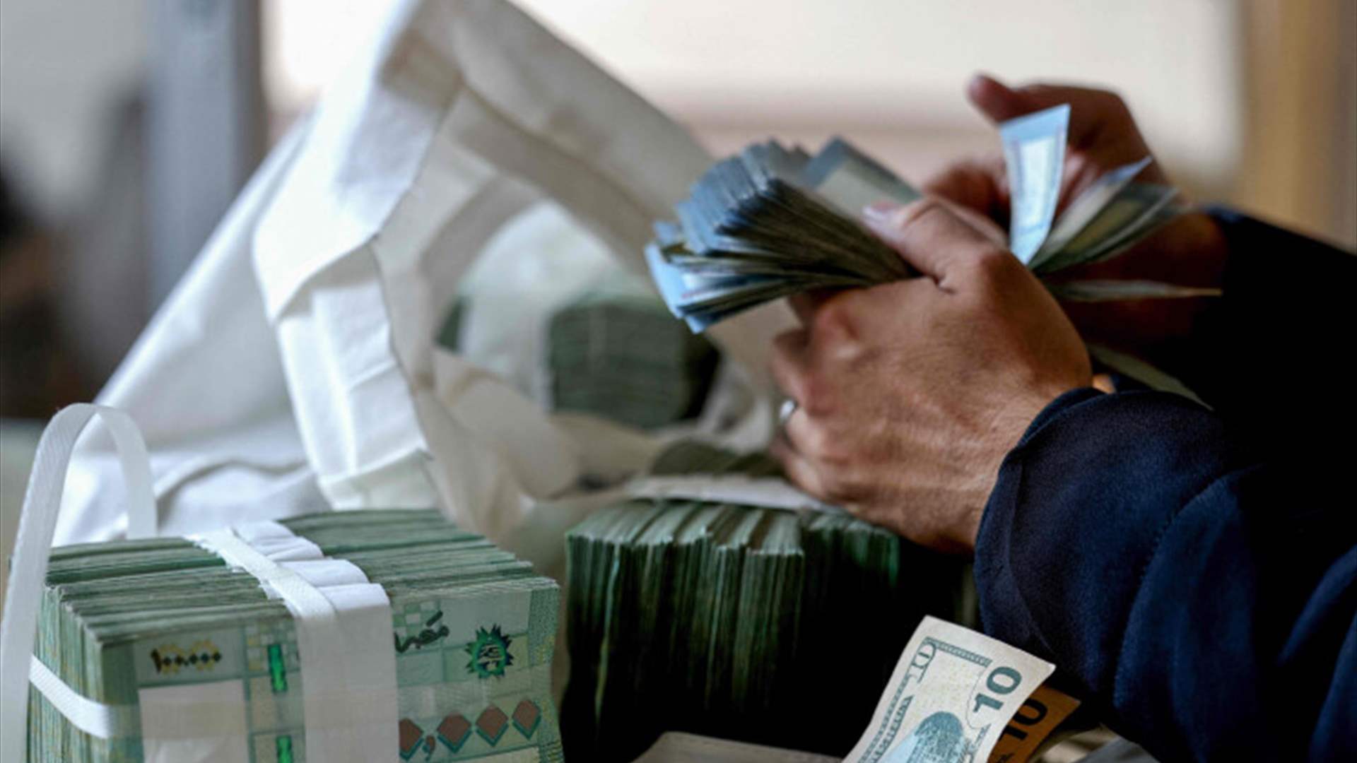 توضيح من نقابة الصرافين بشأن شركة شومان للصيرفة