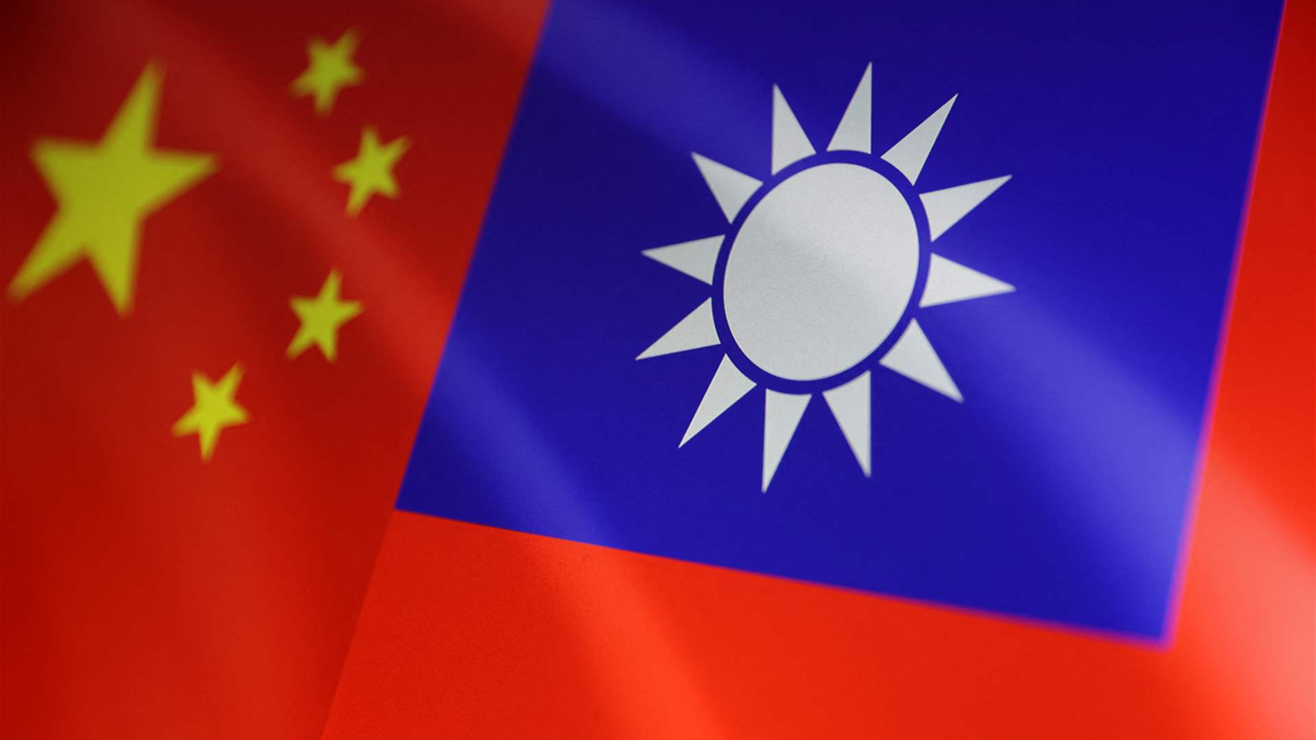 Taiwan says eight Chinese fighter jets crossed strait's median line