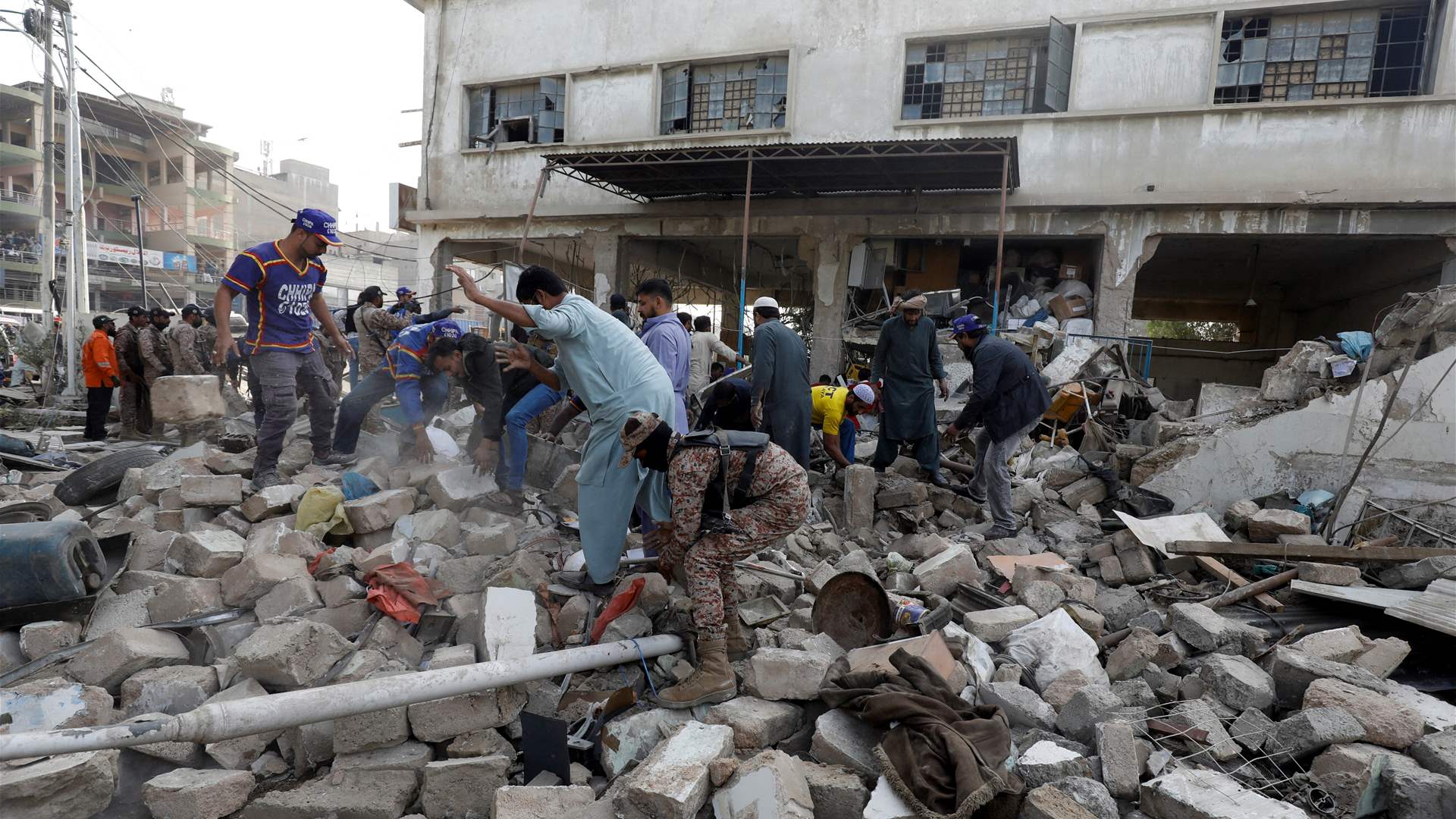 Explosion near Pakistan candidate's office kills 12 on eve of election