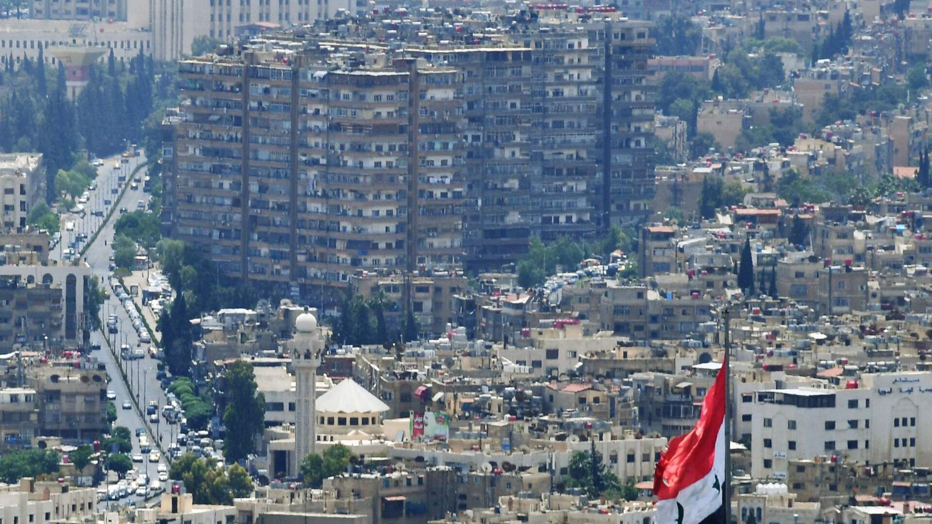 Official media: Syrian air defenses intercept &#39;hostile targets&#39; in vicinity of Damascus