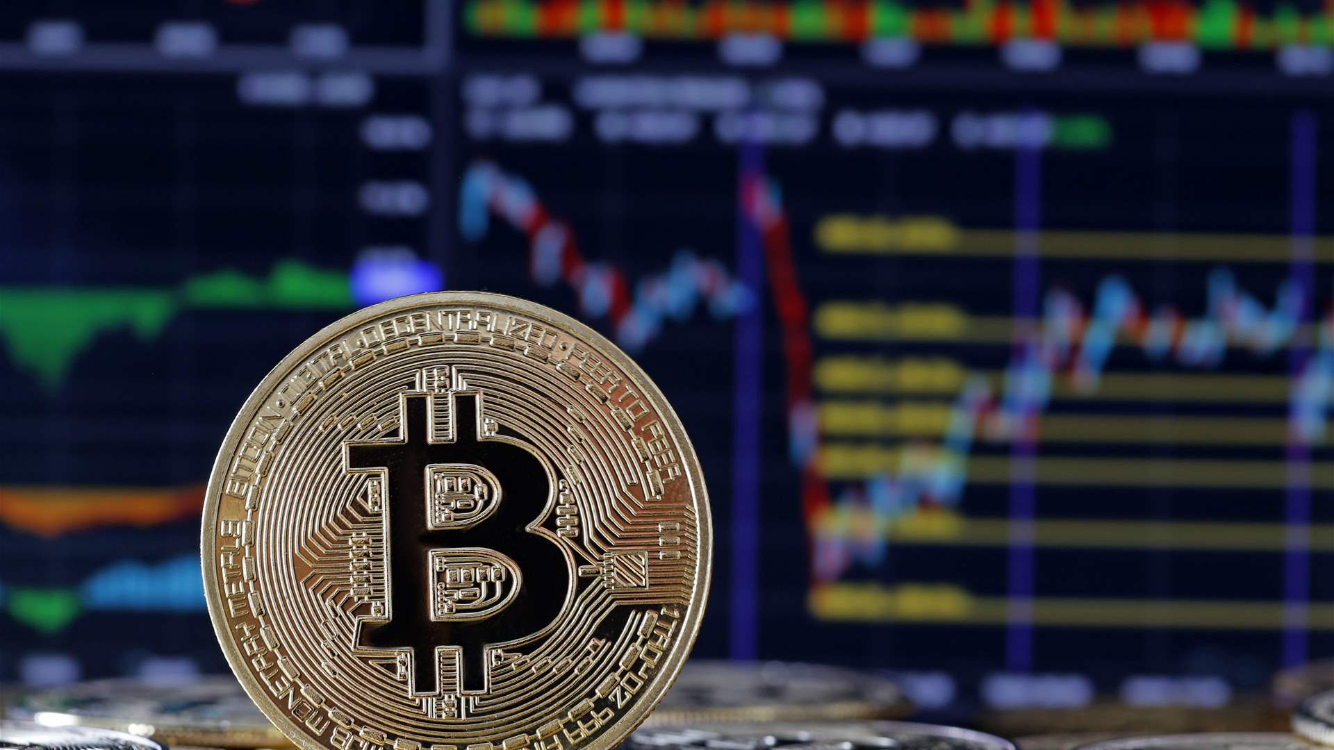Bitcoin hits record above $71,000 as demand rises