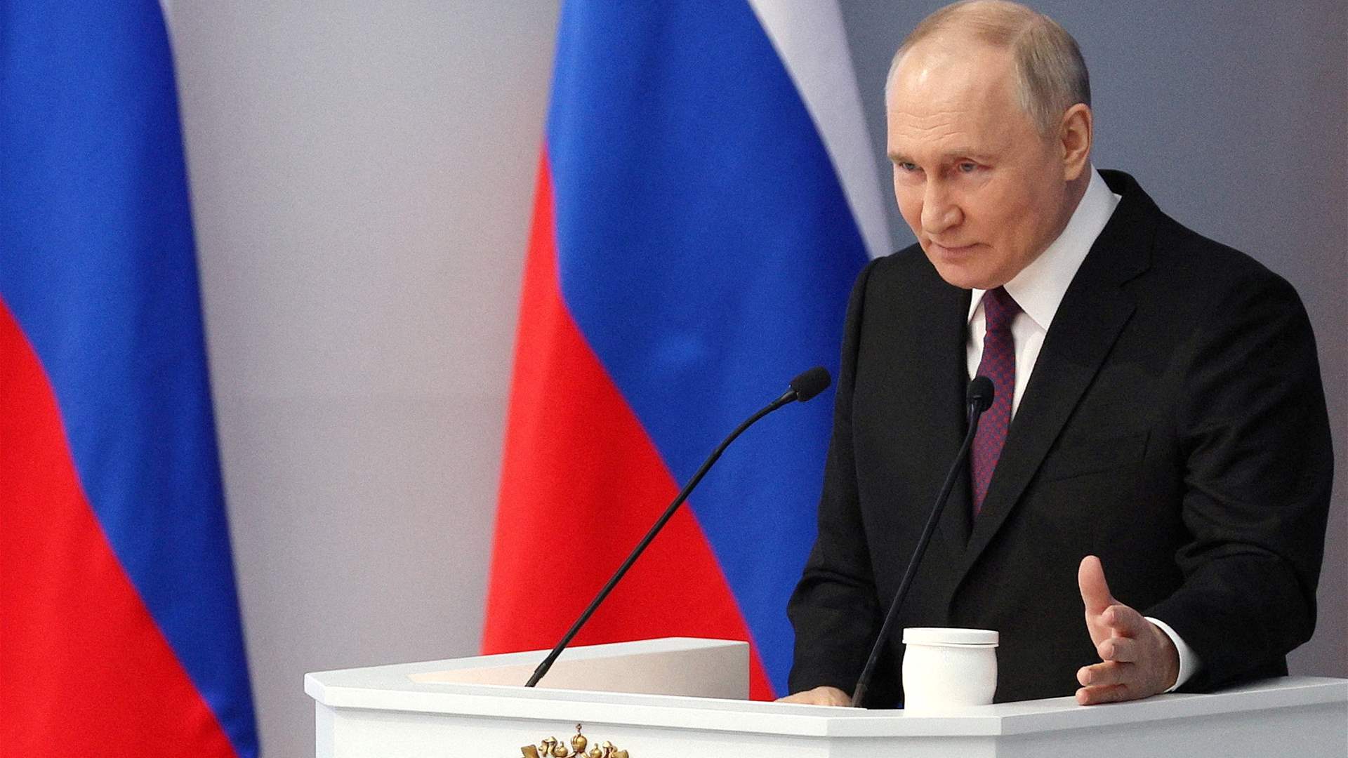 Putin pledges over $126 billion in public spending as election looms