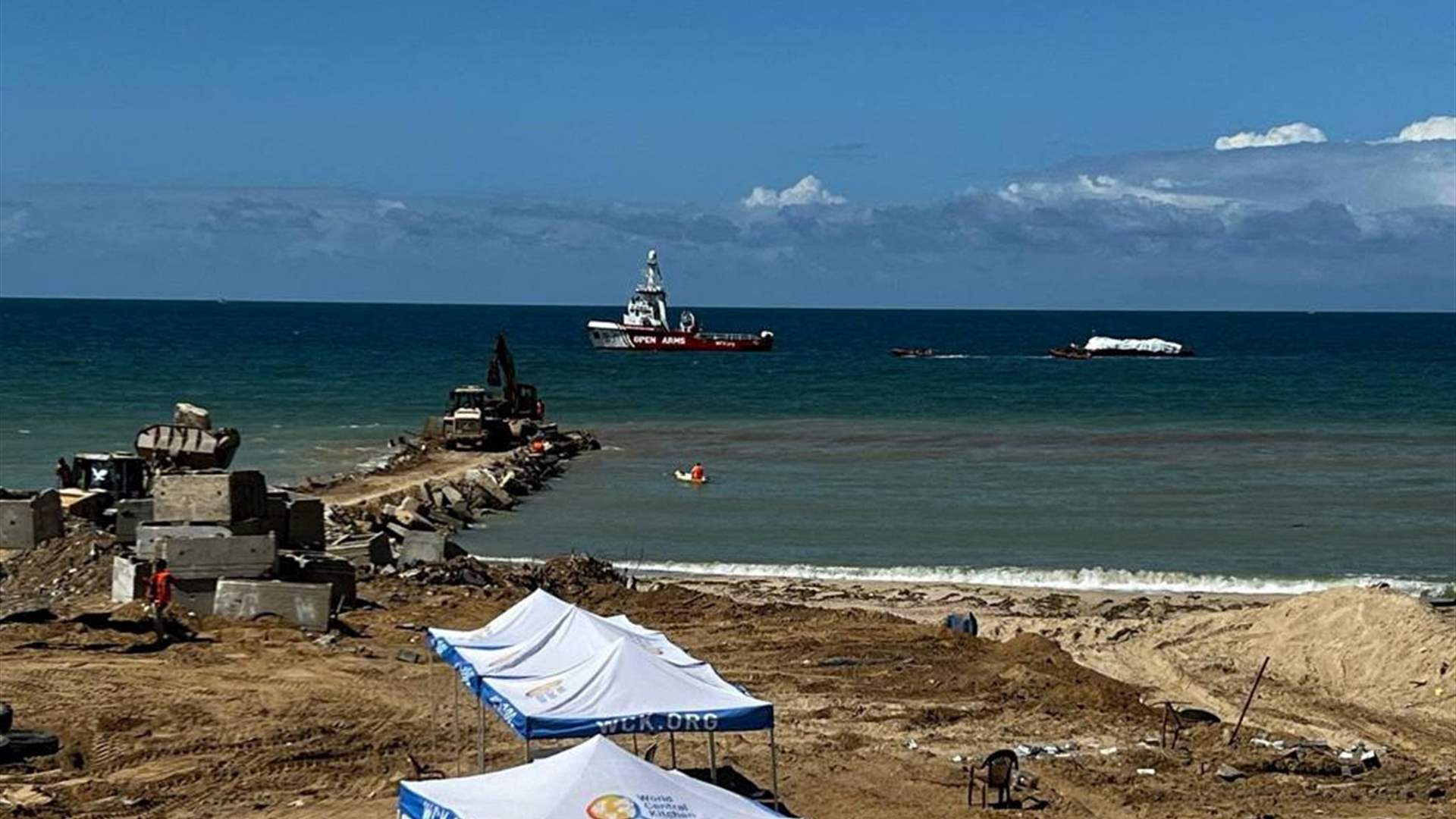 Aid supply ship from Cyprus arrives on Gaza coast; weather slows delivery