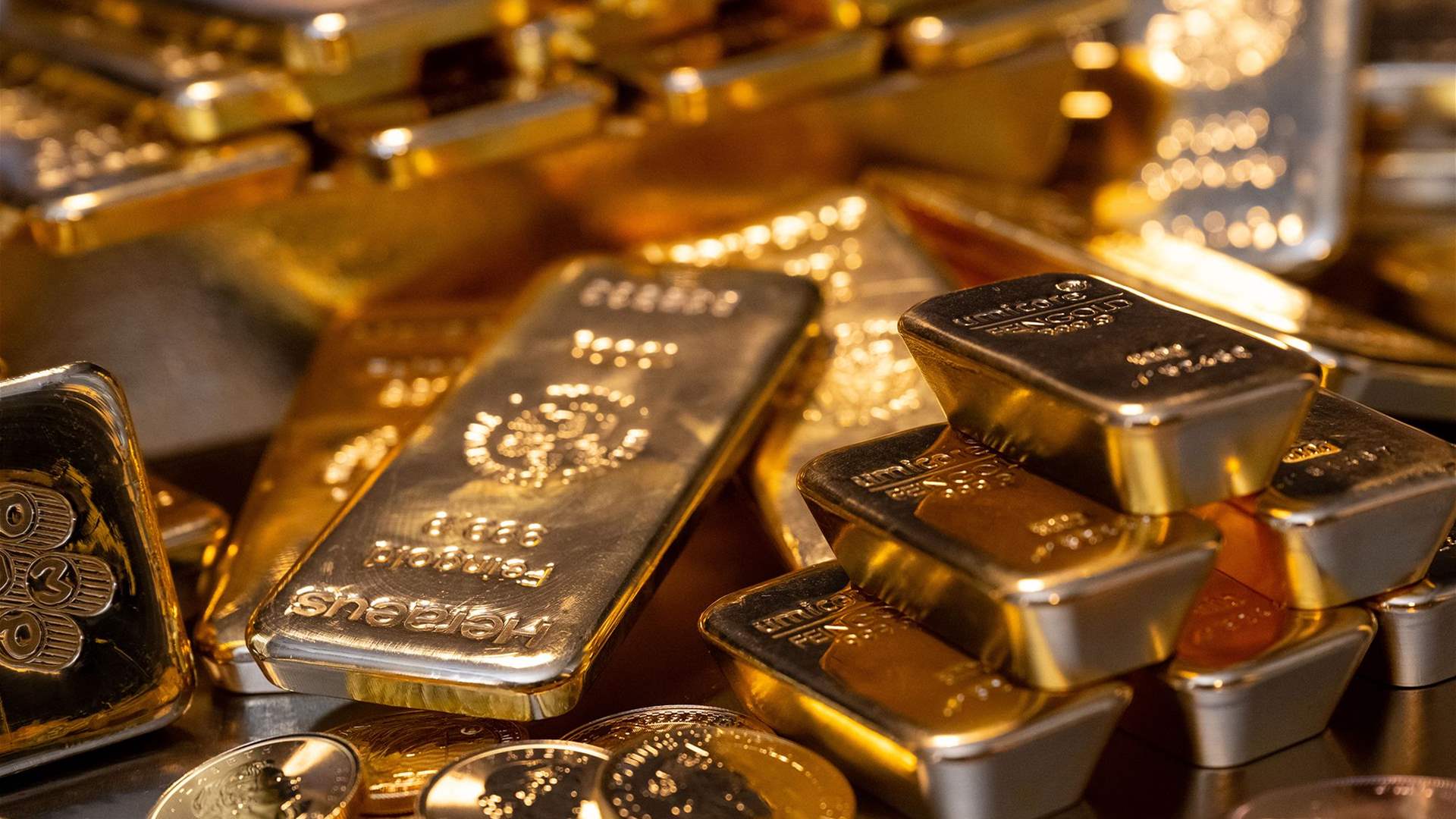 Gold prices rebound to &#39;record high&#39; after Fed comments, US data in focus