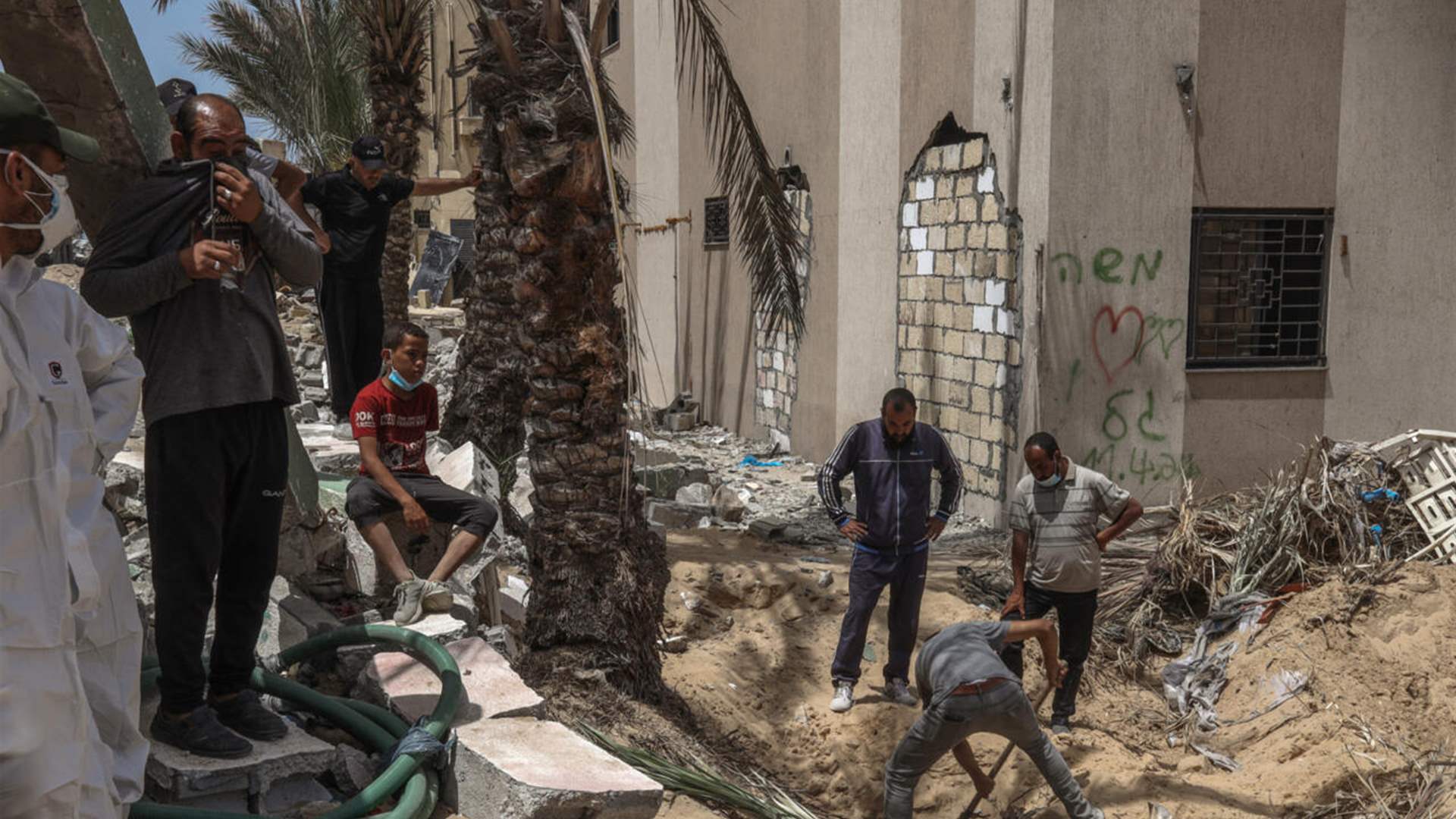 Palestinian authorities seek probe into mass graves at Gaza hospitals