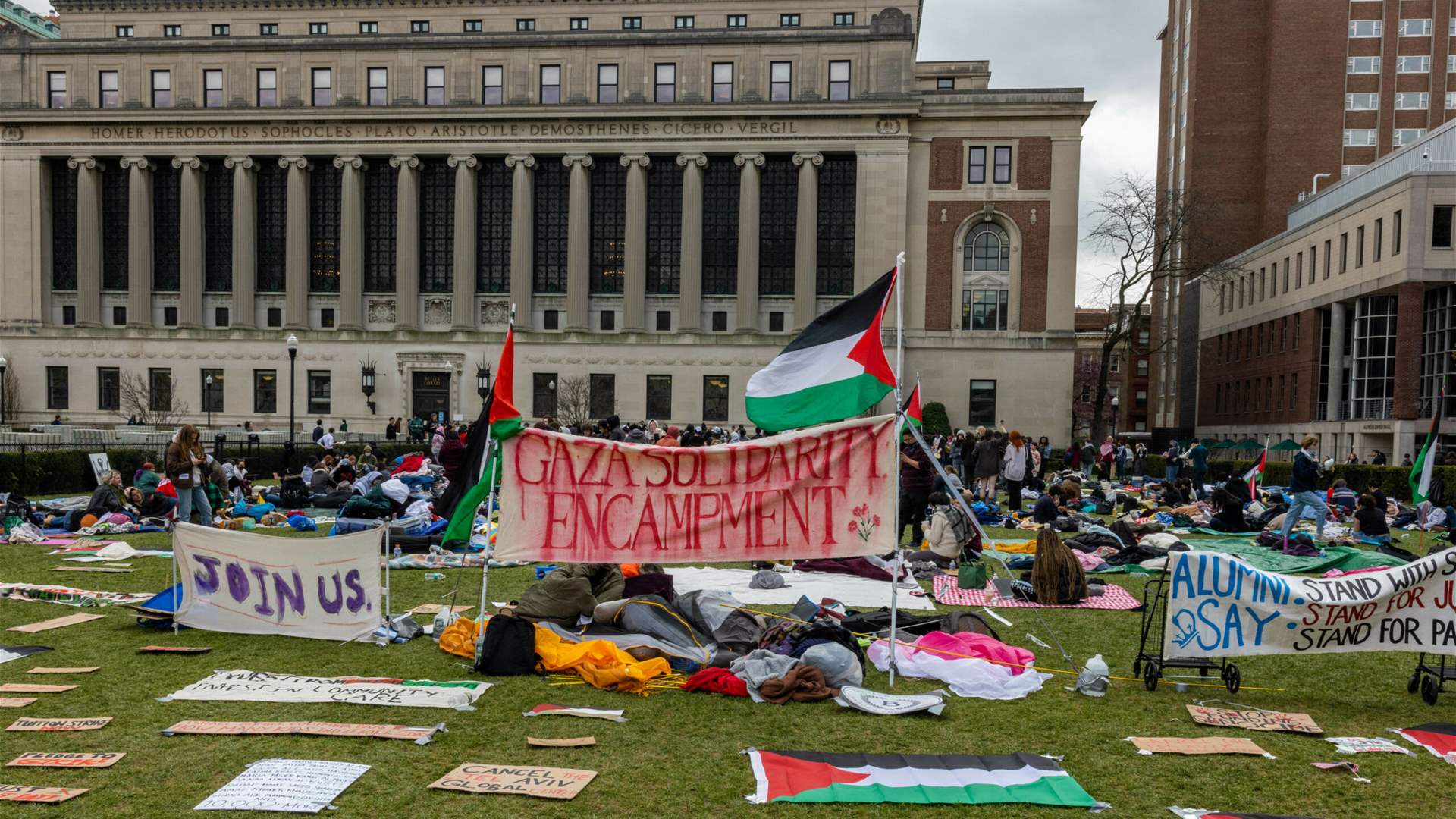 Columbia University threatens to &#39;expel&#39; students occupying one of its buildings
