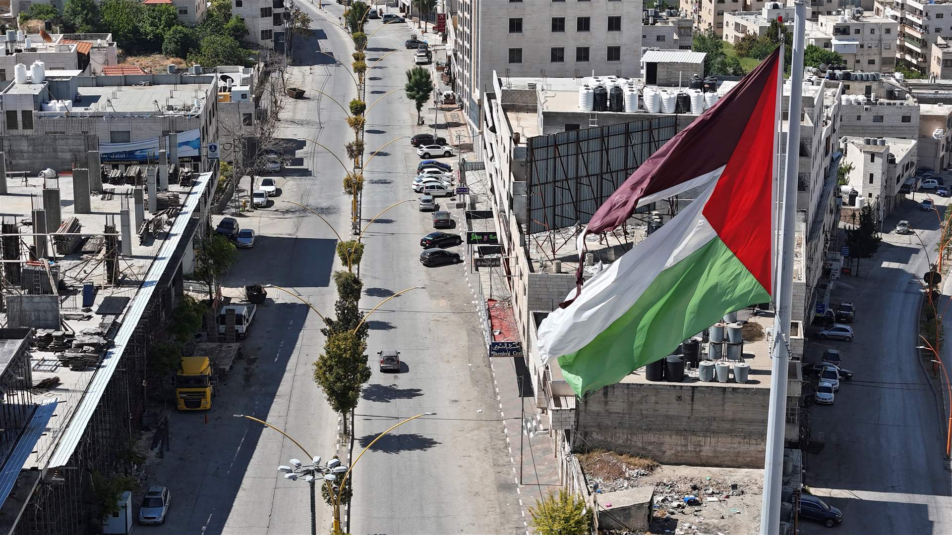 Britain sanctions Israeli groups and individuals for violence in West Bank