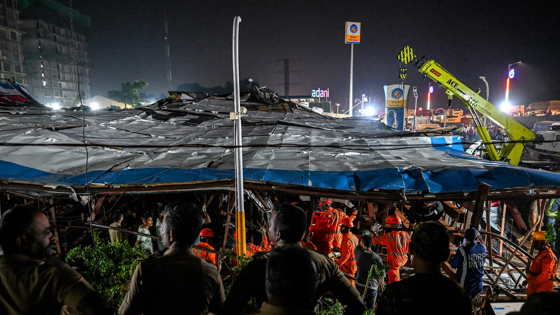 Billboard collapses onto people in Mumbai, India, killing at least 14