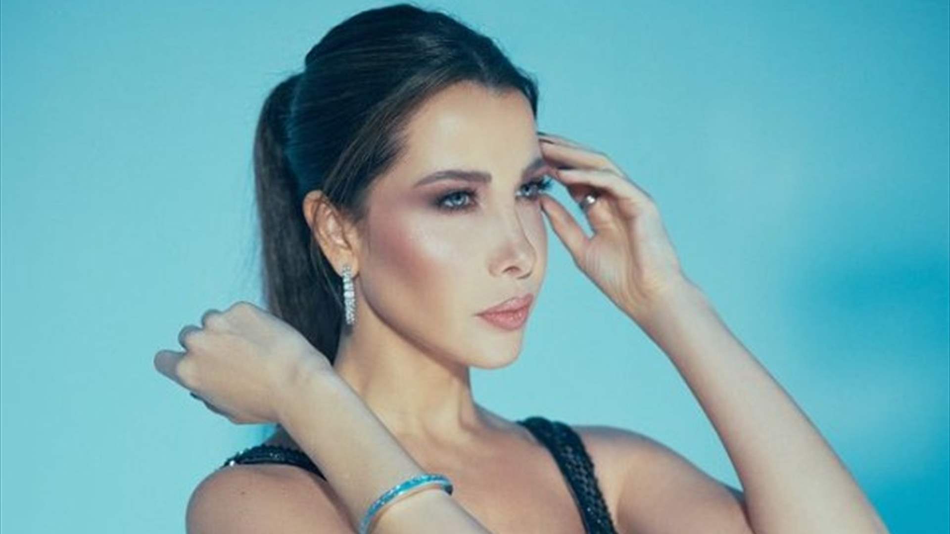 نانسي عجرم تطلّ من بحيرة كومو الإيطاليّة... والبعض يسأل: أين فادي؟