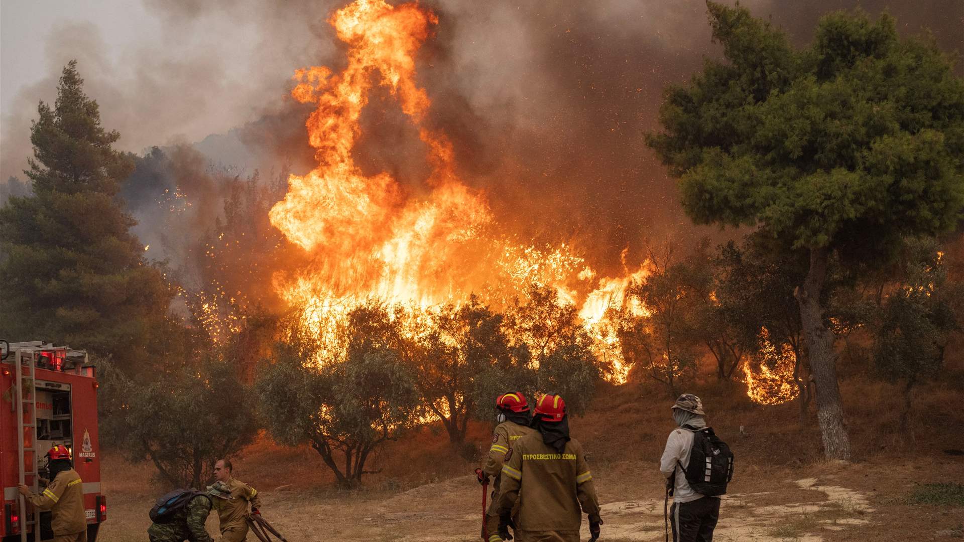Greek police arrest 13 from yacht alleged to have started fire on Hydra