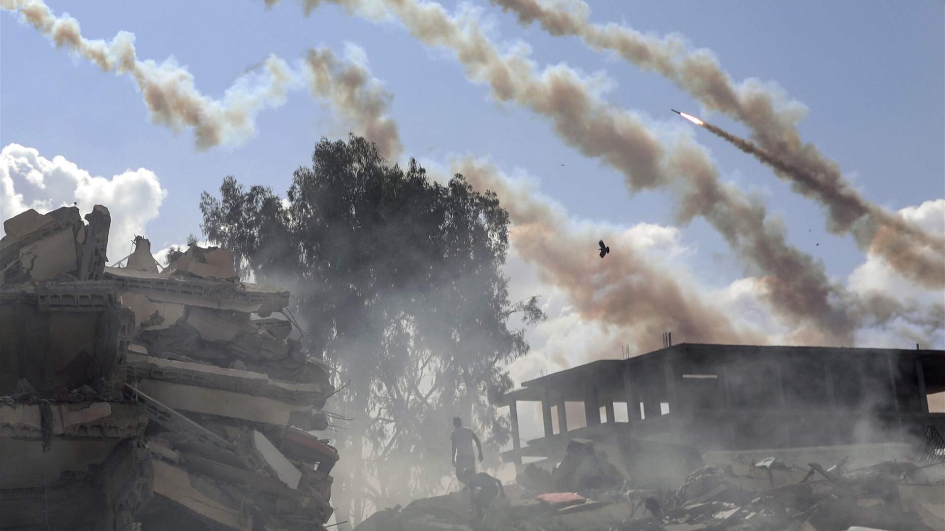Hezbollah fires 100 rockets at Israeli positions following commander&#39;s death