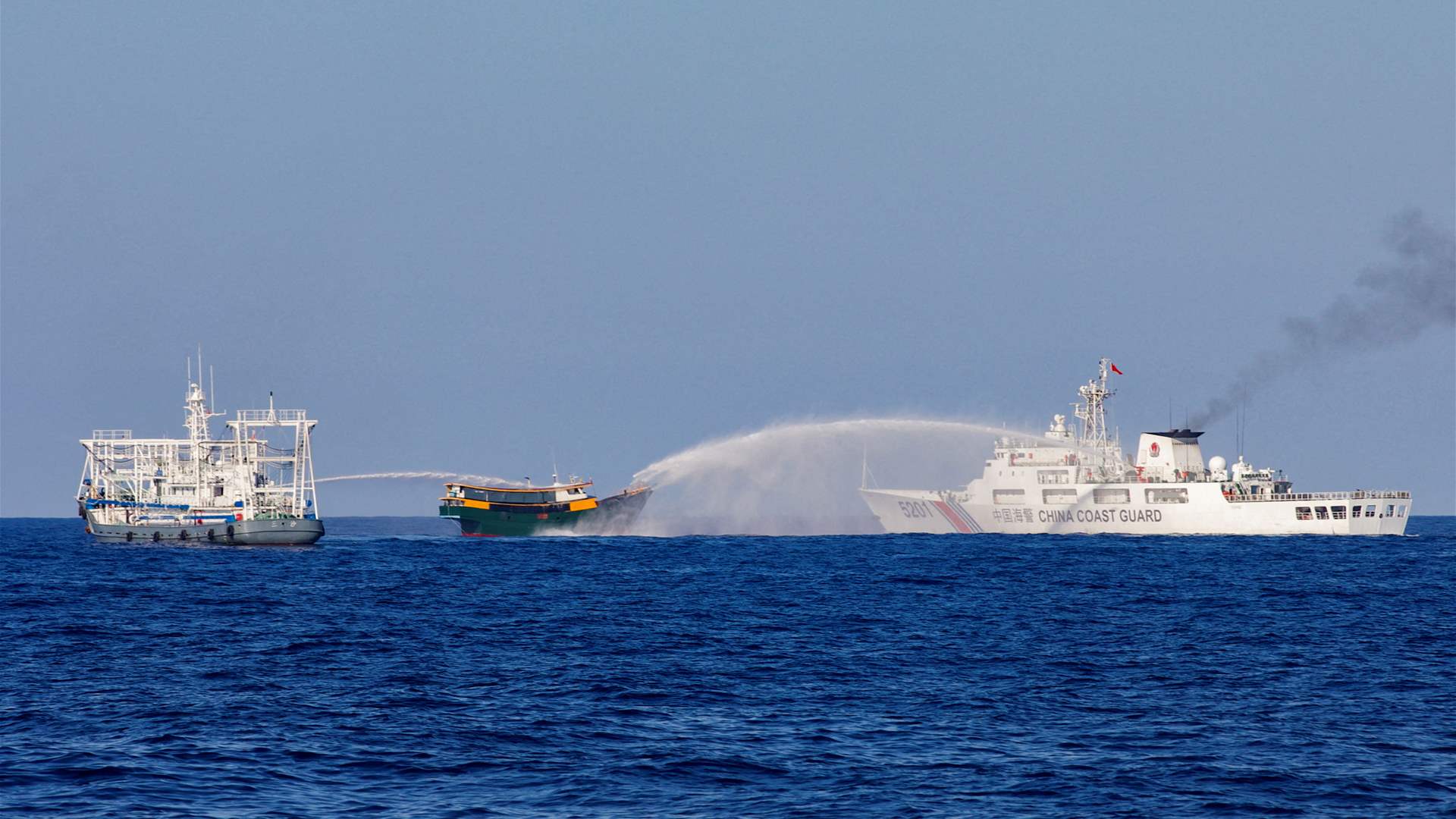 Philippines says has agreed with China on an &#39;arrangement&#39; for resupplying Filipino troops on reef