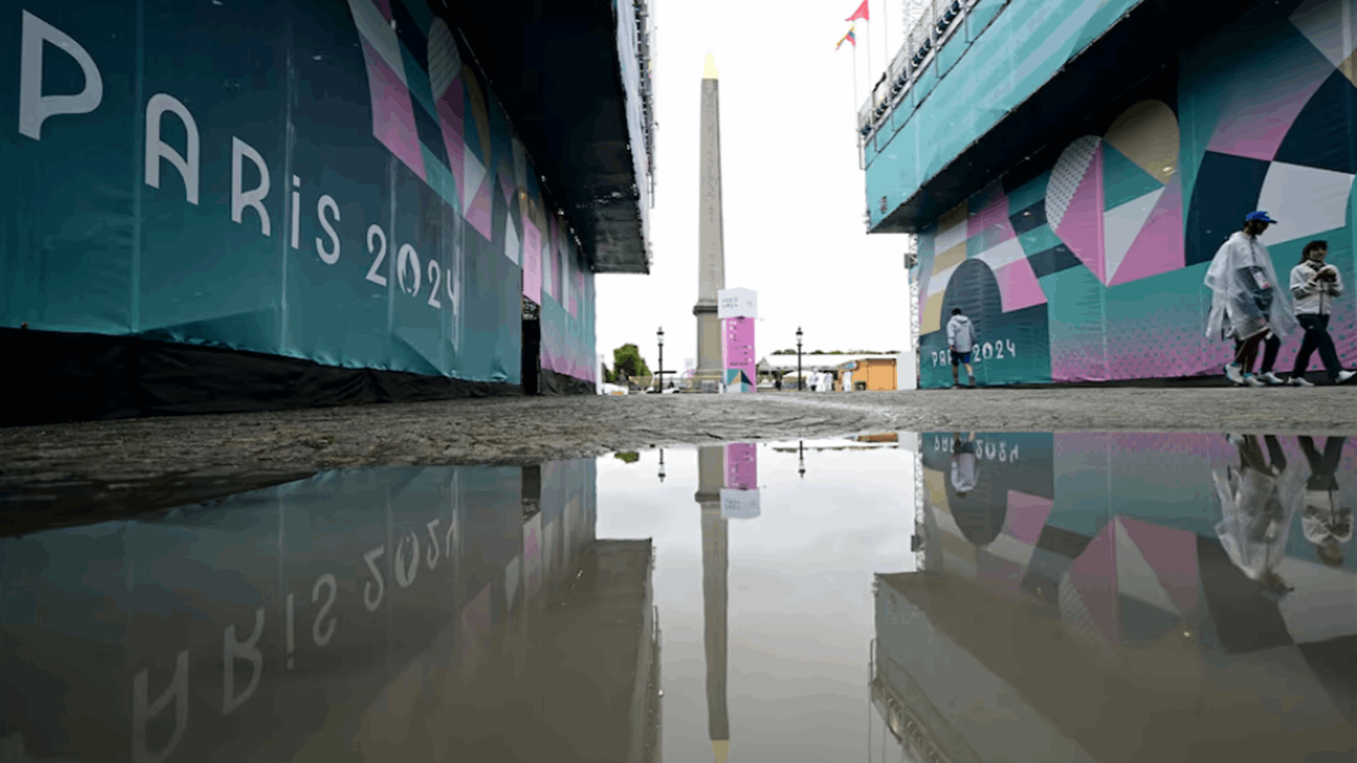 Pouring rain disrupts Games after drenched opening ceremony