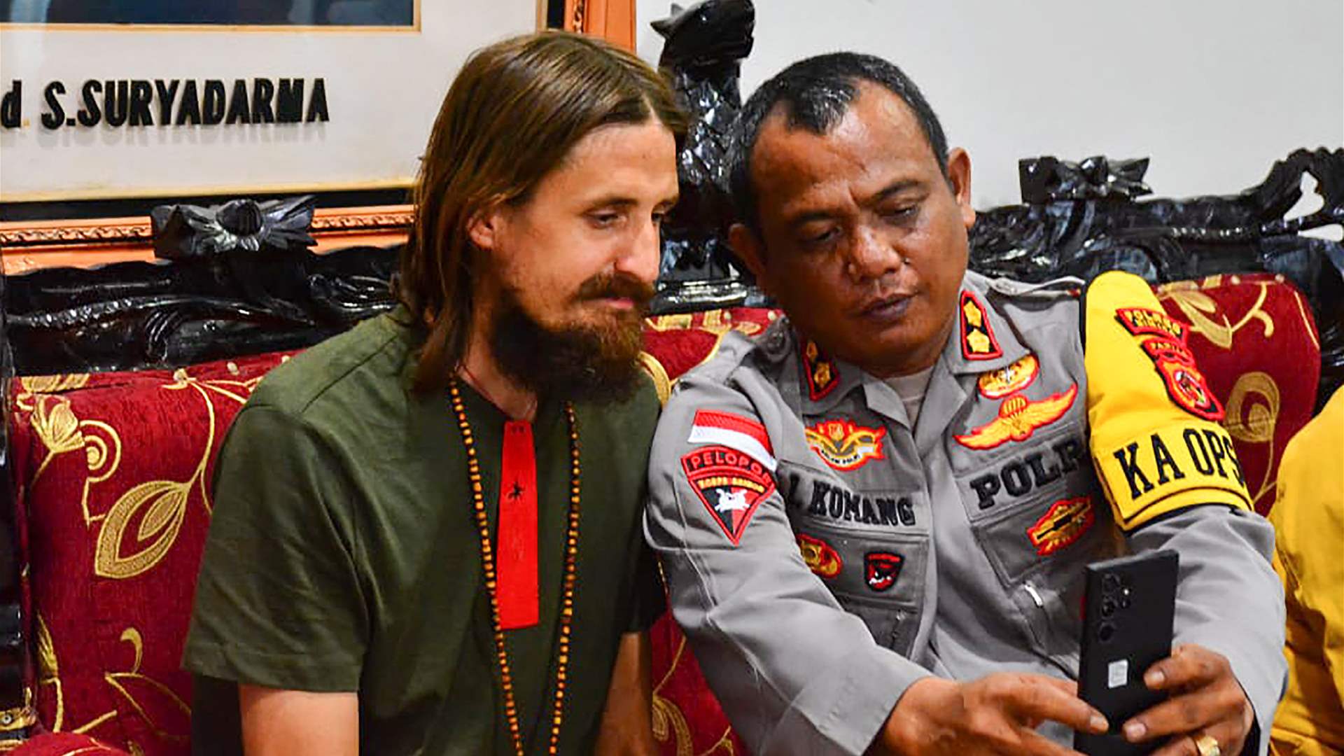 New Zealand pilot freed by Papua rebels says 'very happy' to go home