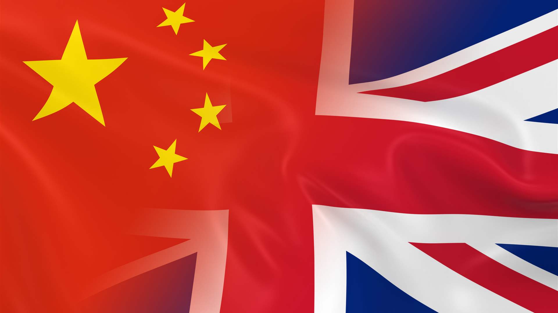 UK's foreign minister travels to China seeking 'pragmatic' ties