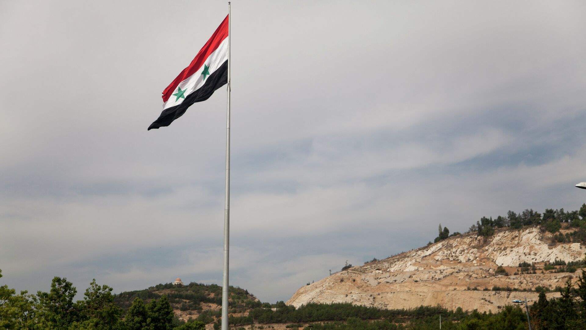 Syria's Assad says conflict in north a bid to 'redraw map' of region