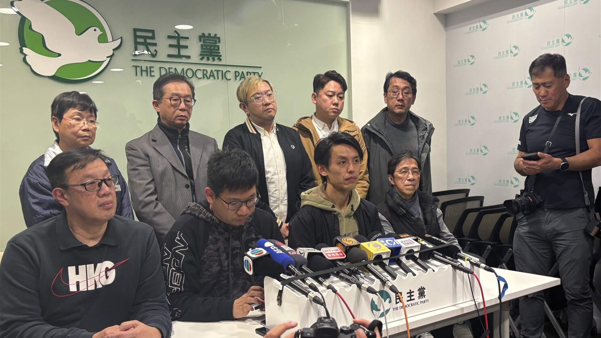 Members of Hong Kong&#39;s Democratic Party approve plan to disband