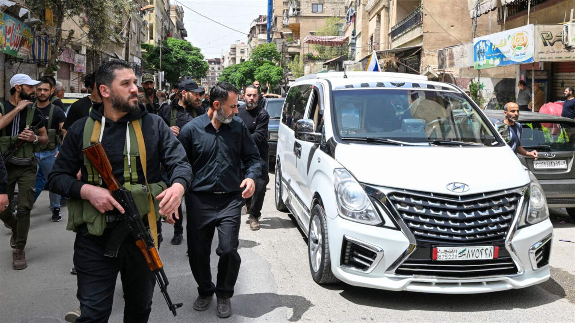 Syria monitor says sectarian clashes toll tops 100