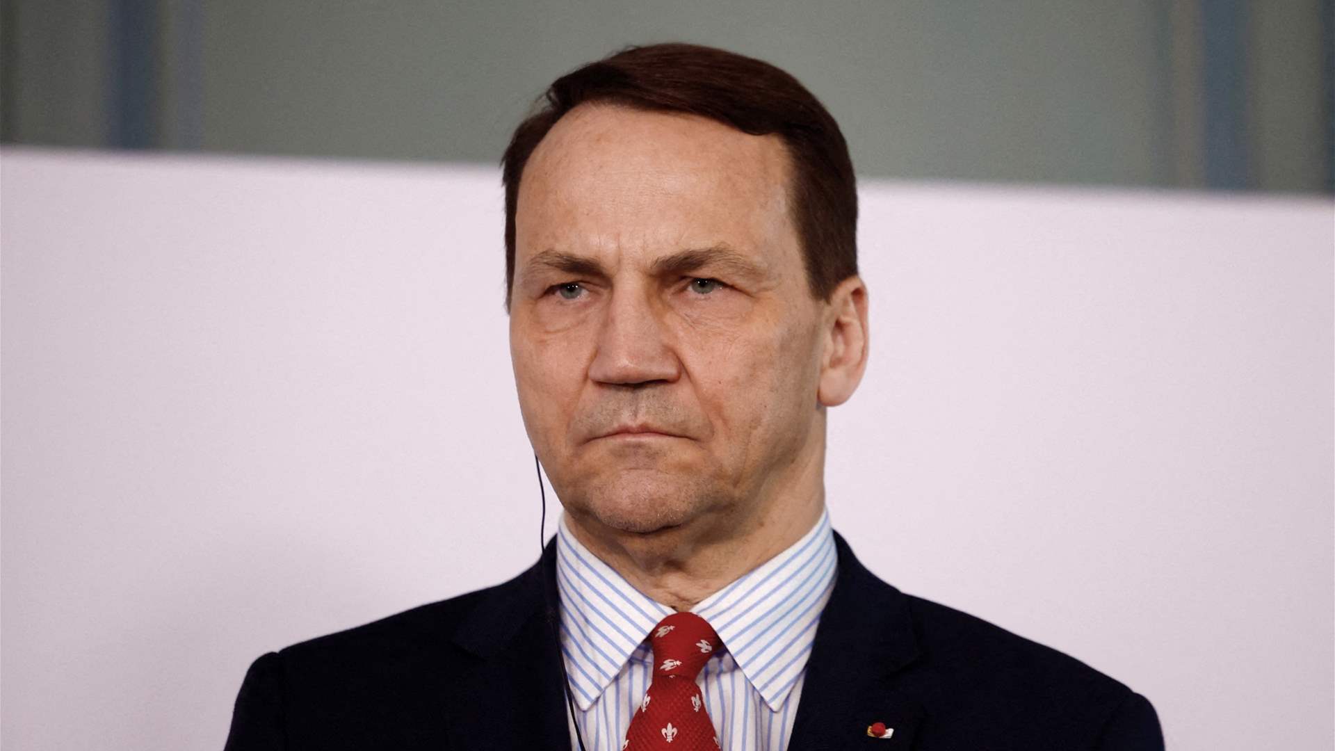 Poland&#39;s Sikorski says arms race could lead to Putin&#39;s fall, like it toppled USSR