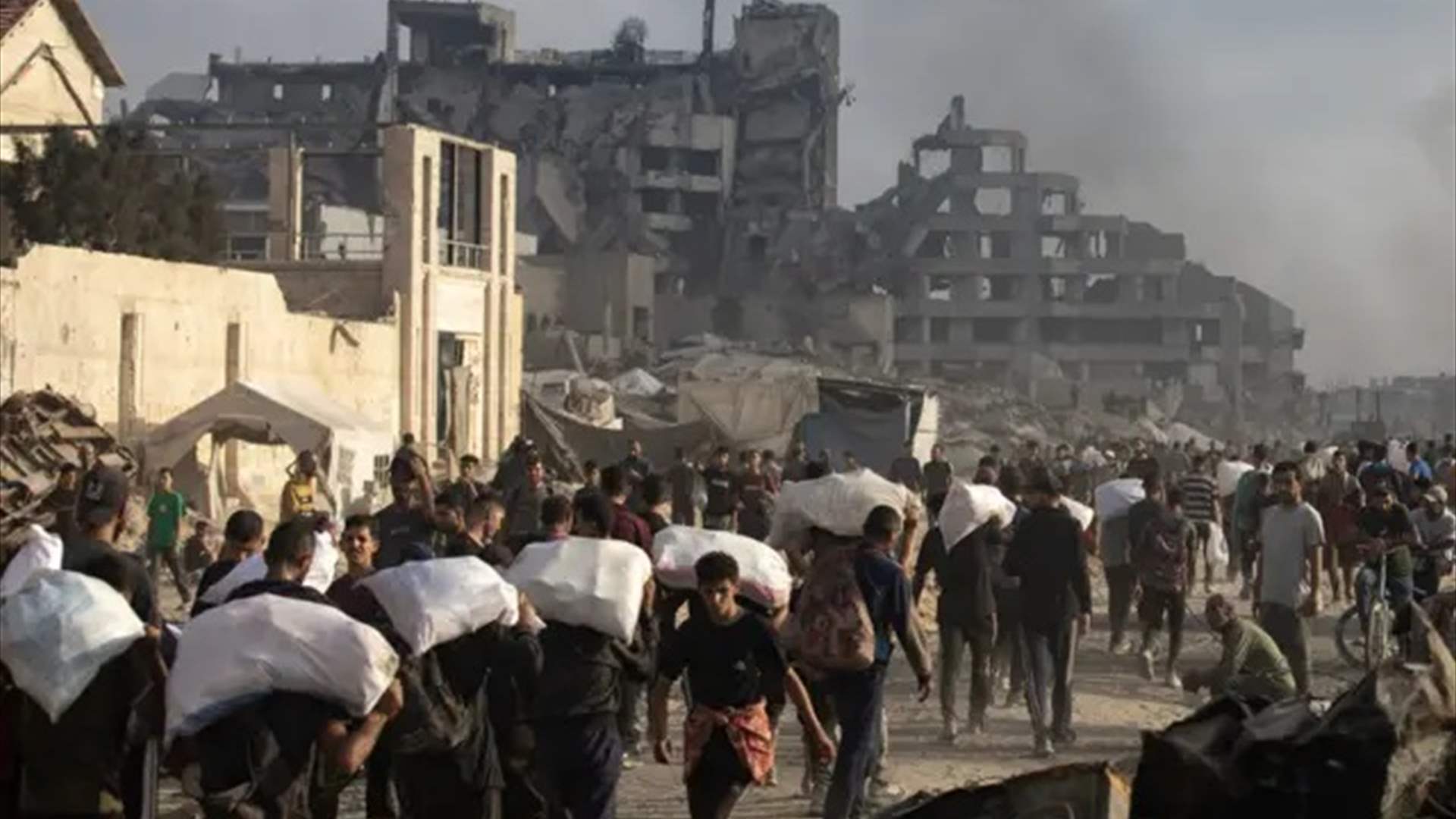 الدفاع المدني بغزة: استشهاد 11 فلسطينيا اثنان منهم بانتظار المساعدات