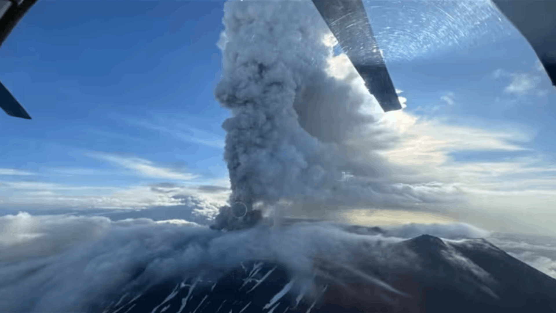 Russia cancels tsunami warning for Kamchatka after quake, dormant volcano erupts
