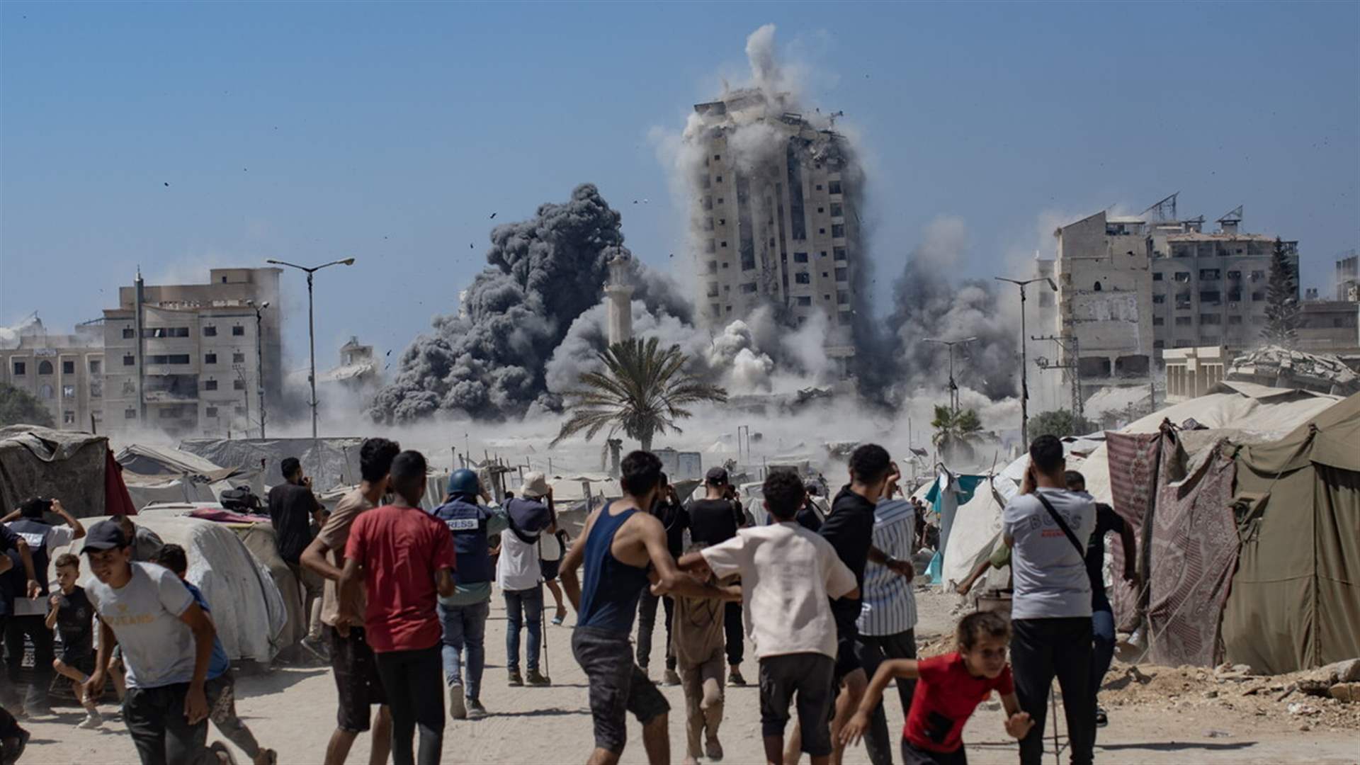 Israeli army says it hit another high-rise in Gaza City after evacuation order