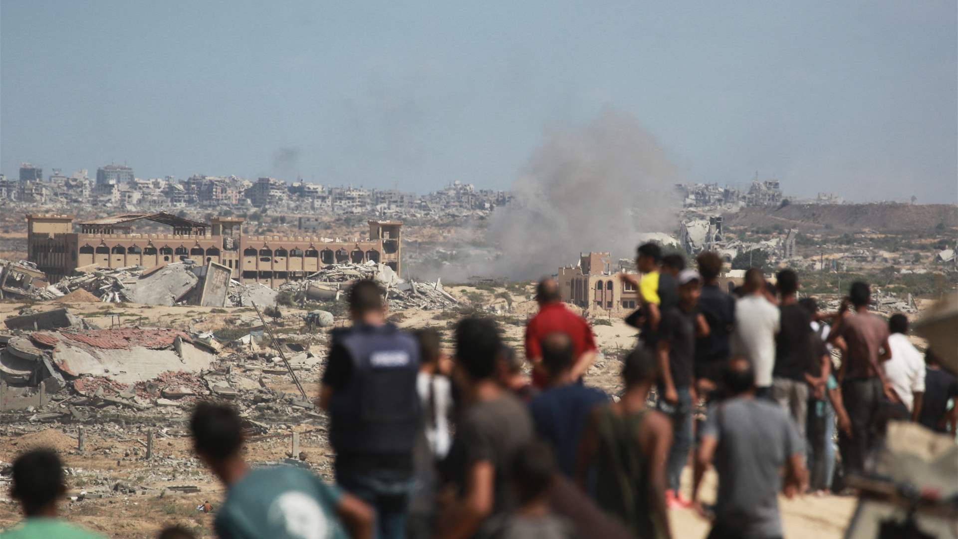Gaza civil defense says 52 killed in Israeli strikes