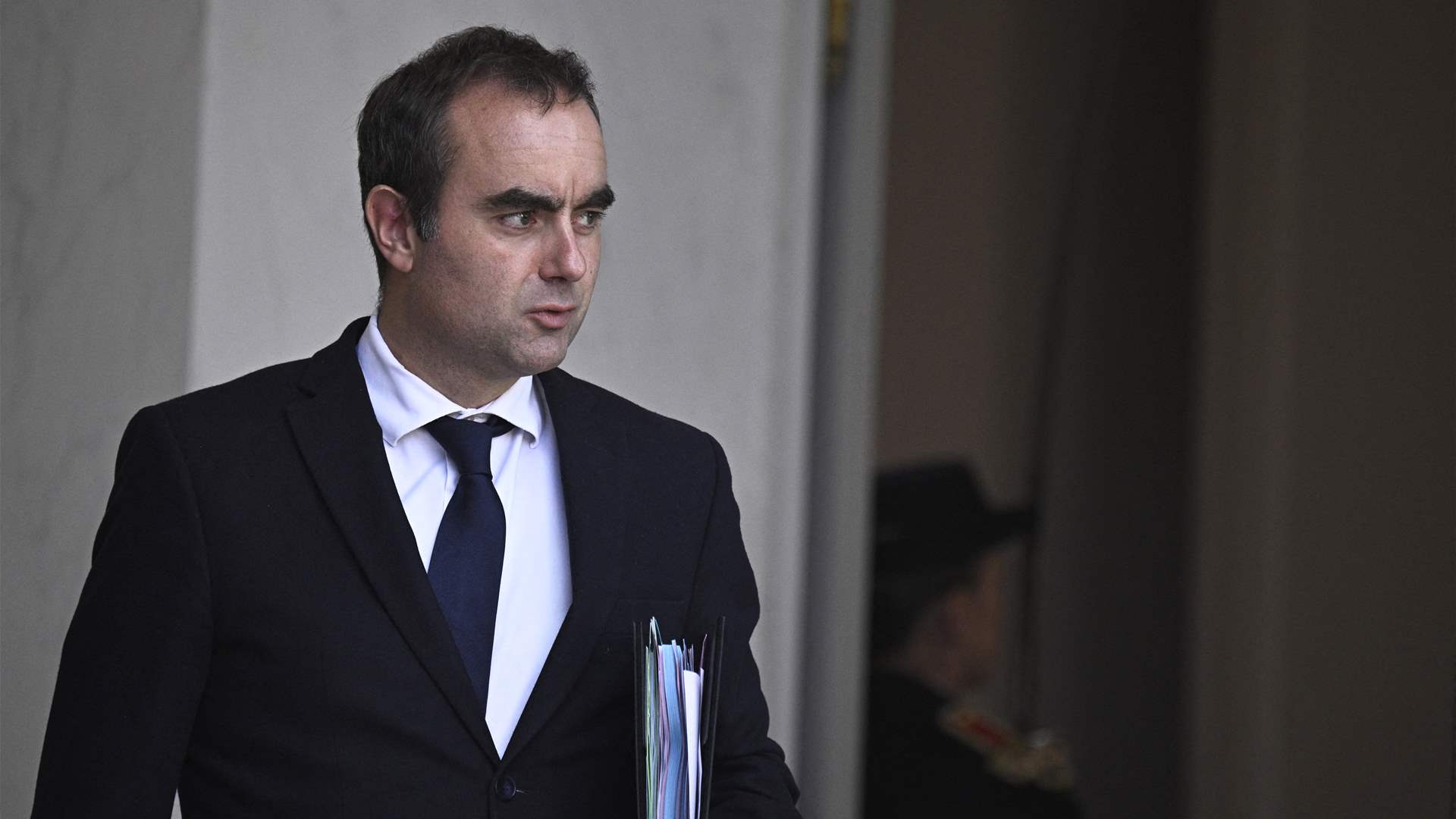 French PM survives two confidence votes days after reappointment