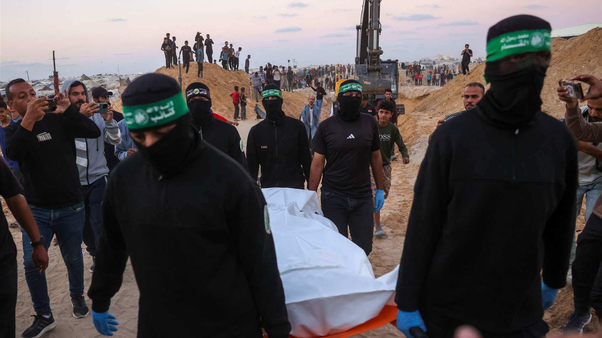 Hamas says postponing hostage body handover due to Israeli truce &#39;violations&#39;