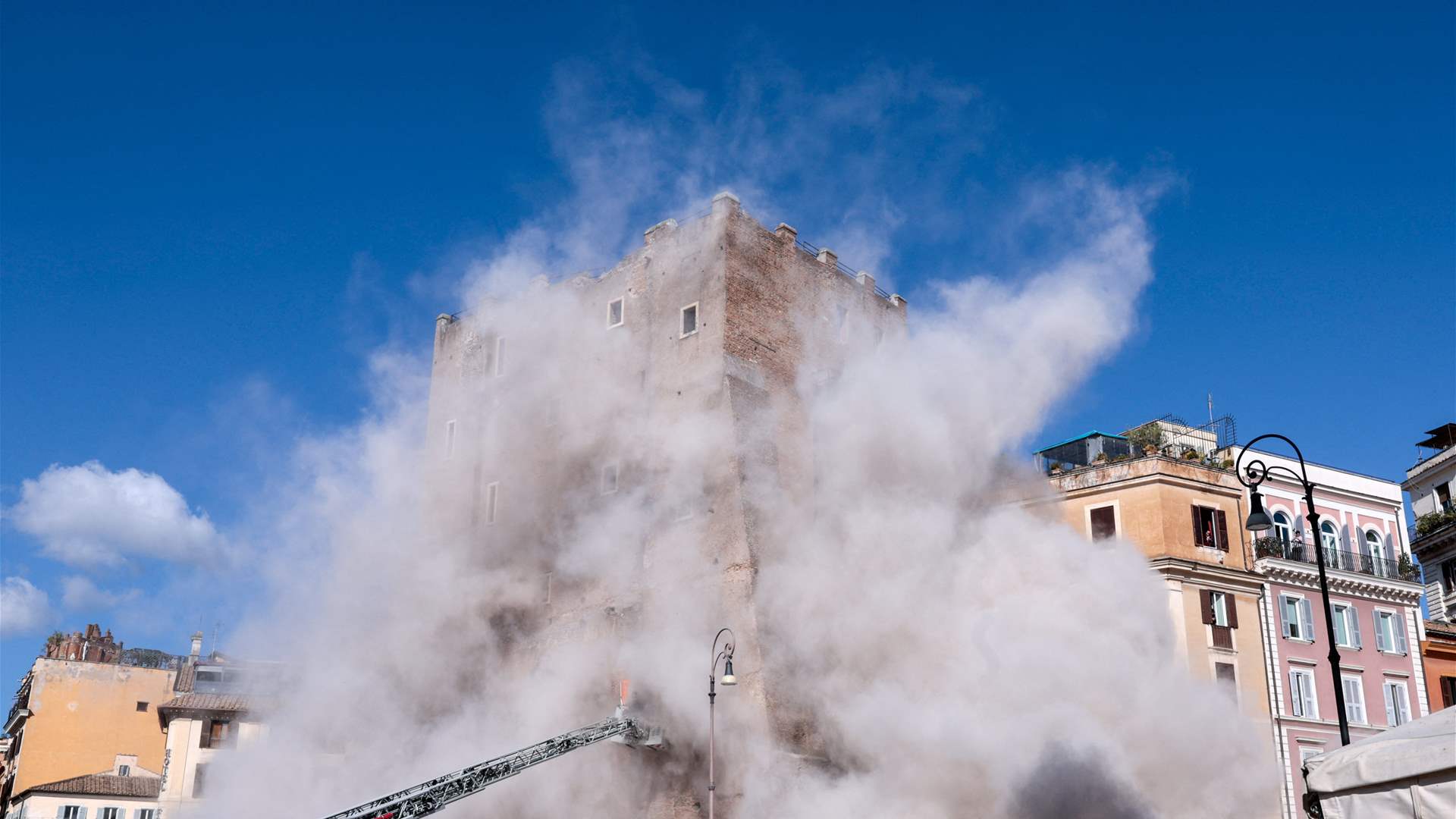 Workers injured in partial collapse of medieval tower near Rome&#39;s Colosseum