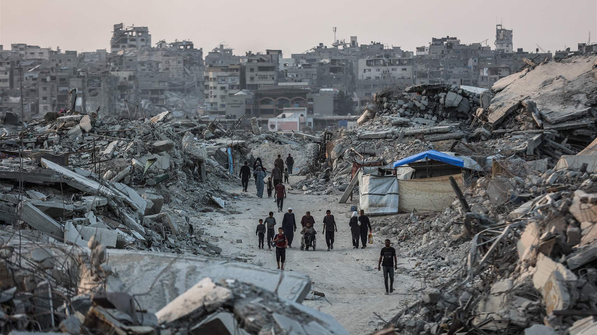 Gaza civil defense says 21 killed in Israeli strikes