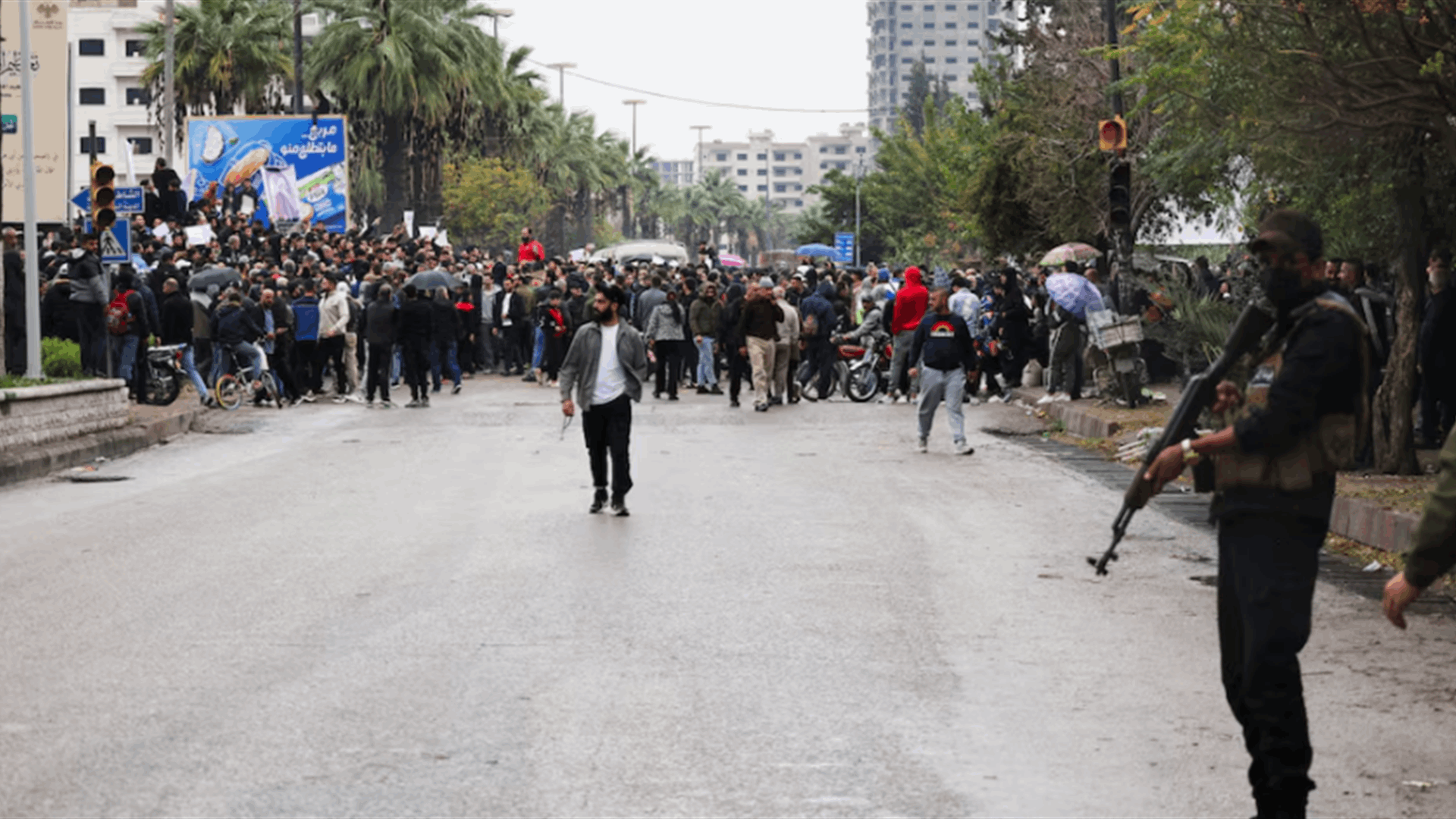 Syrian security forces use gunfire to disperse rival protests in Alawite heartland