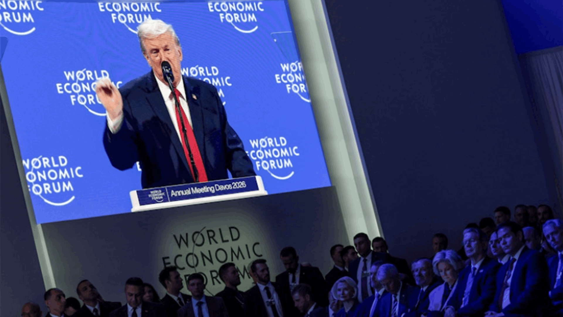 Trump mocks France's Macron at Davos for playing 'tough'
