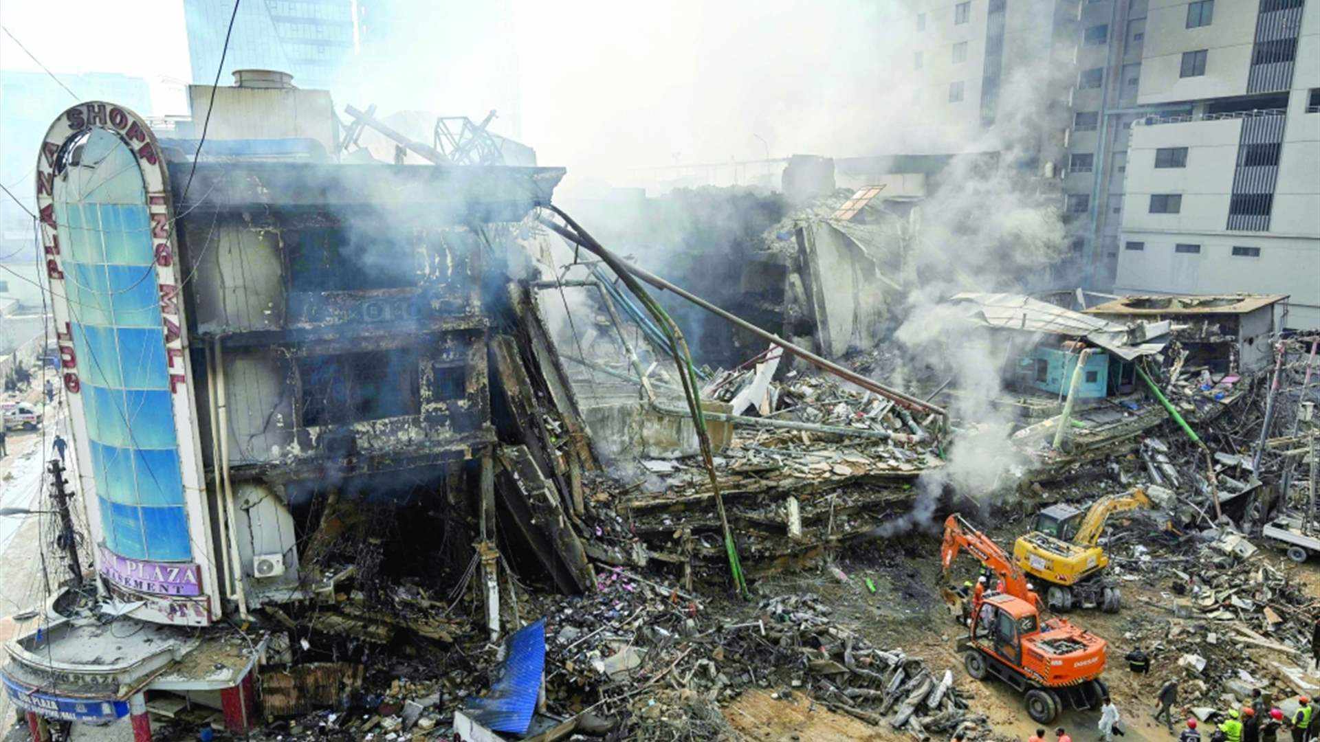 ارتفاع حصيلة قتلى الحريق في مركز تجاري بباكستان إلى 55 