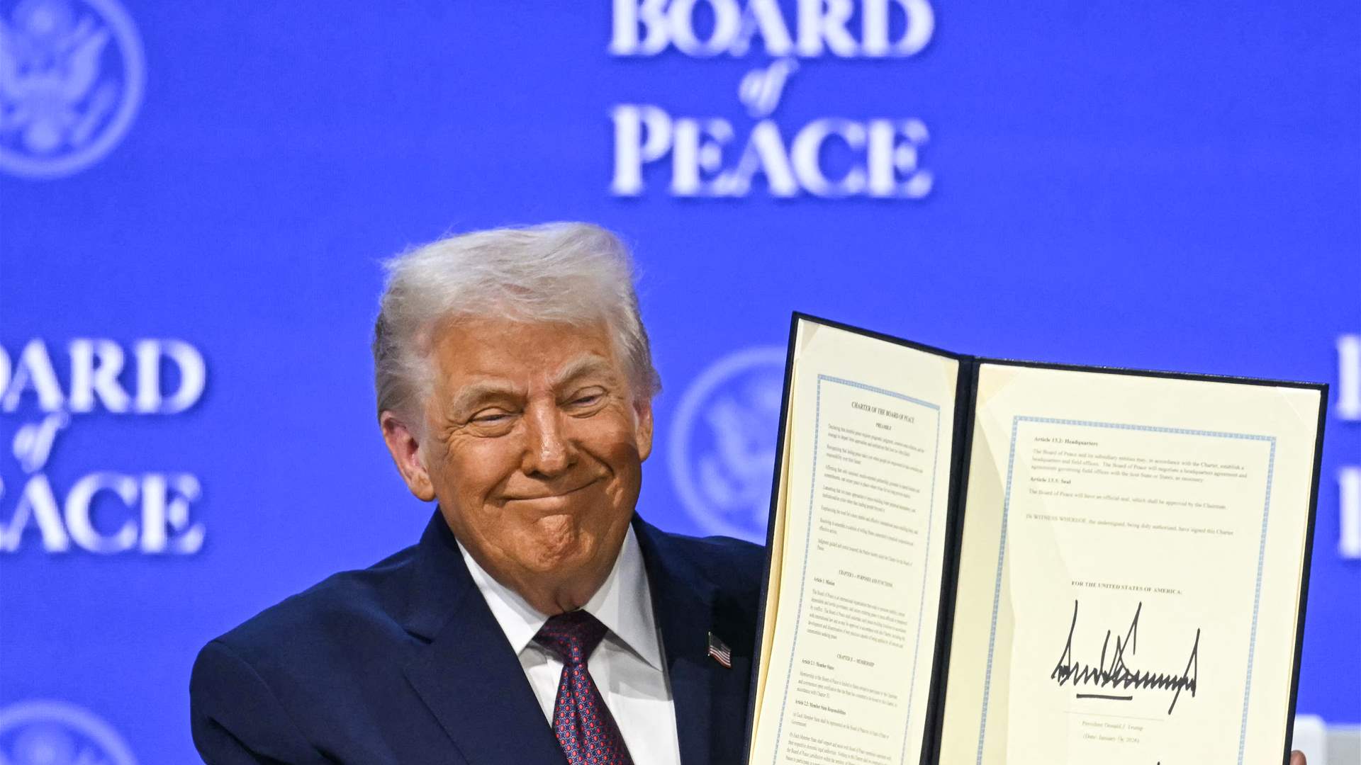 Trump says Iran wants to talk 'and we'll talk', signs charter of 'Board of Peace' at Davos