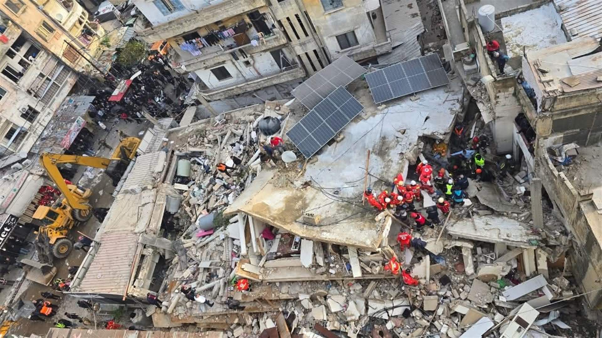 In photos: Woman rescued as search continues after five-story building collapses in Tripoli, investigation ordered