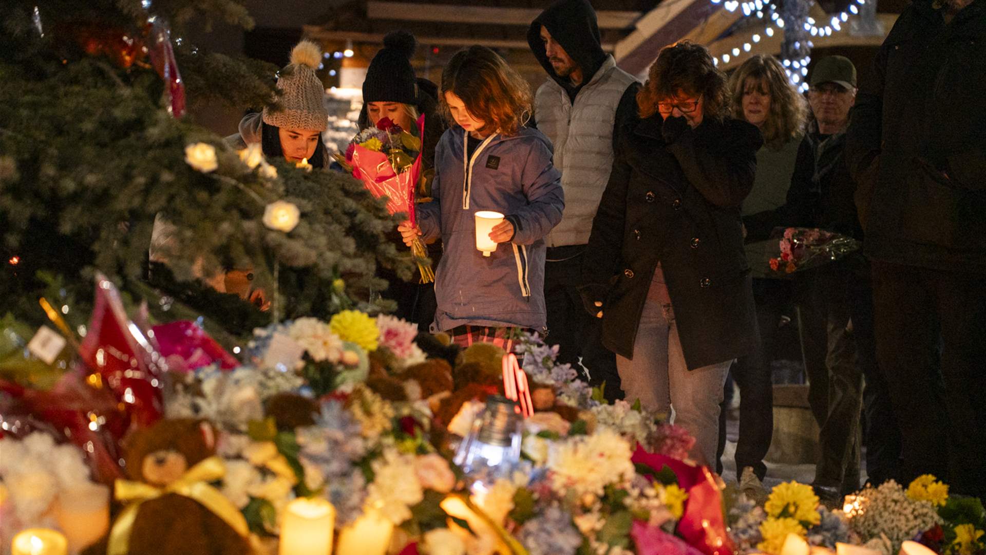 Grieving Canada town holds vigil for school shooting victims
