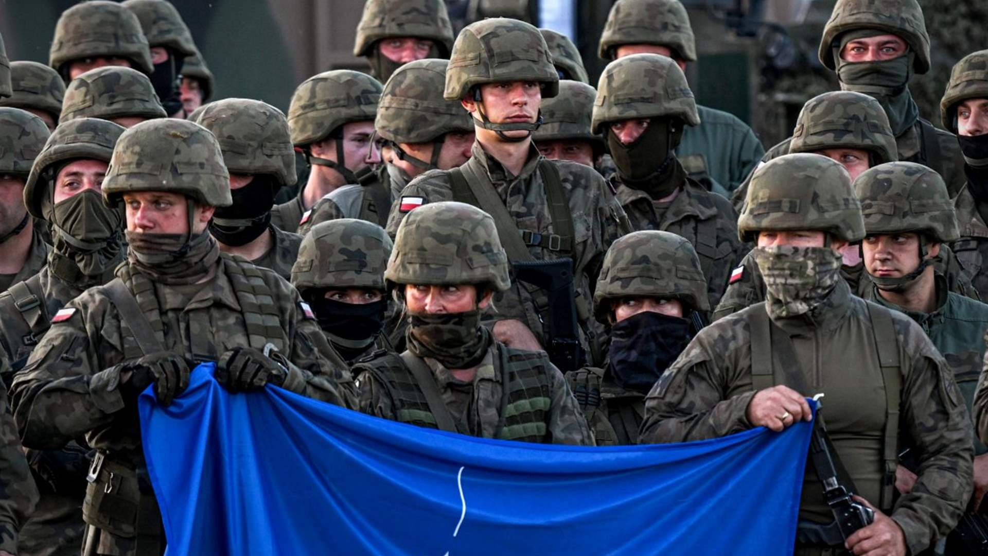 NATO says 'adjusting' Iraq mission