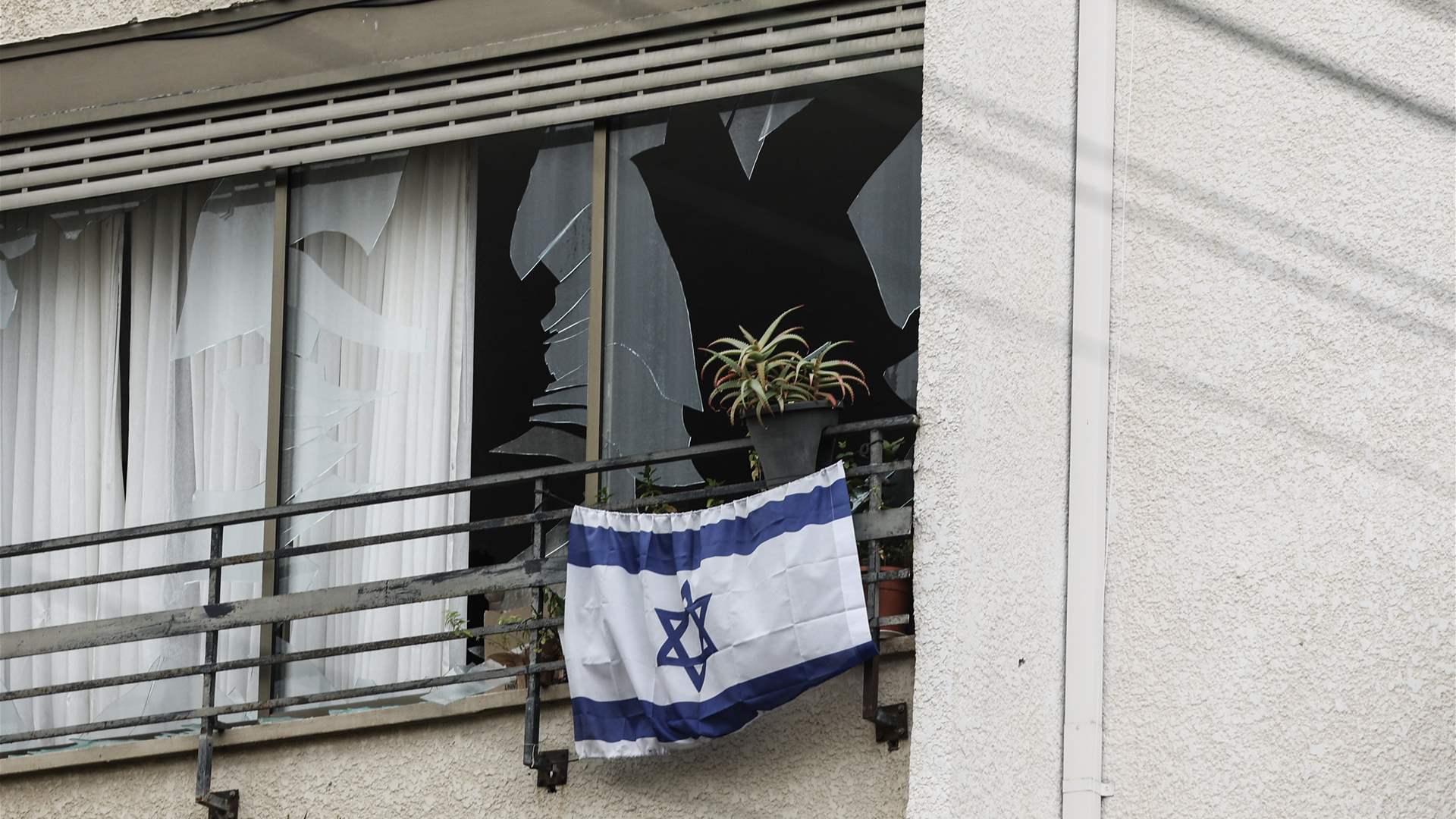 Tel Aviv shelters fill as missile attacks coincide with strikes on Lebanon