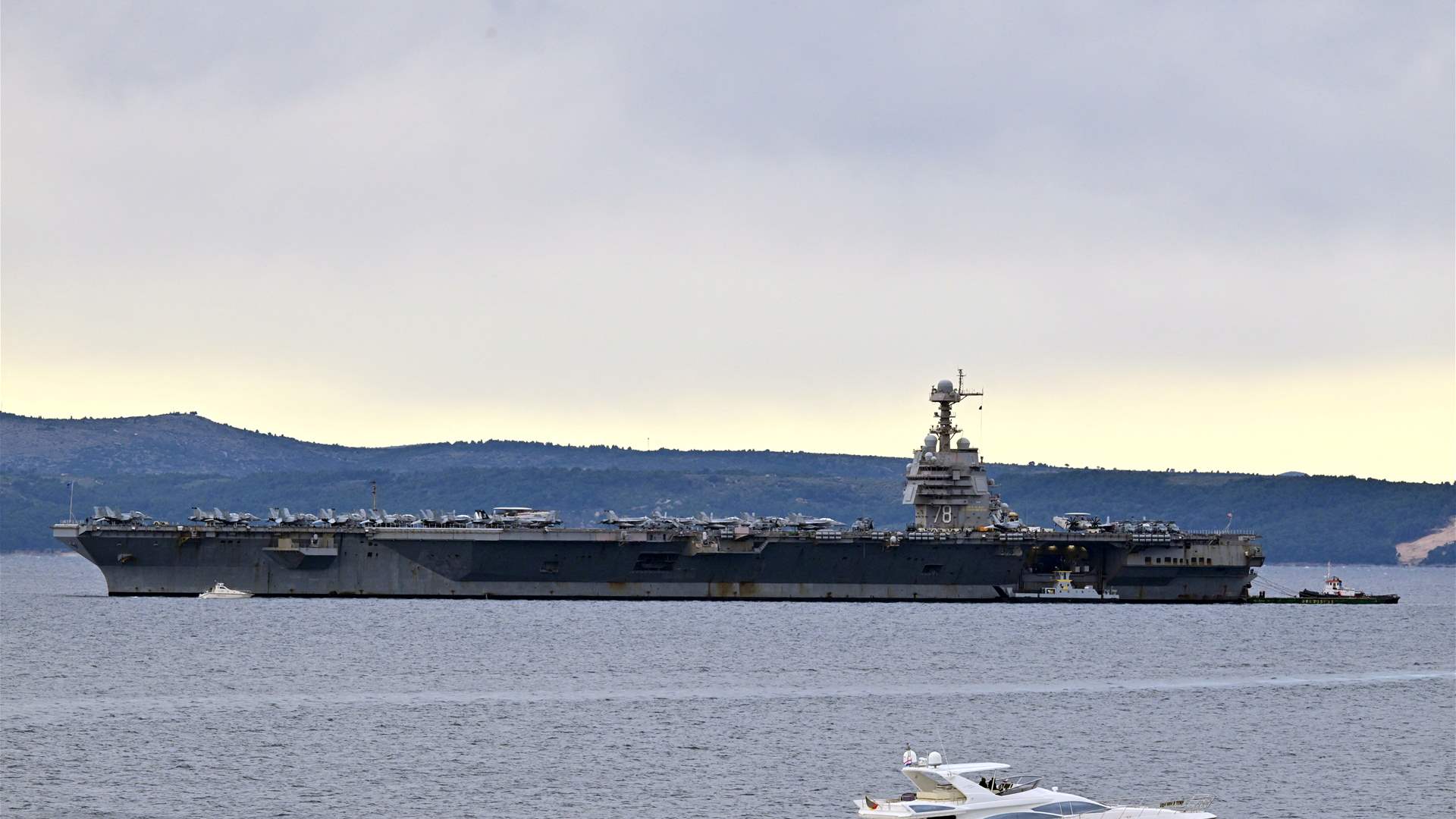 Iran allows essential goods vessels to its ports via Hormuz strait, Tasnim says